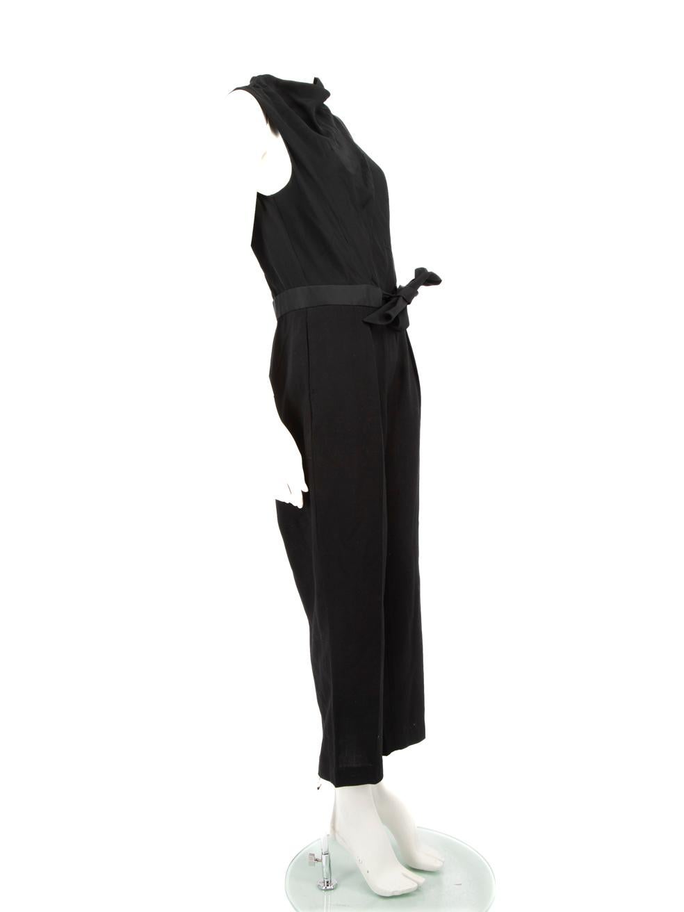 CONDITION is Very good. Minimal wear to the jumpsuit is evident, there is mild discolouration in the lining of the underarms and the brand label on this used 3.1 Phillip Lim designer resale item.
 
 Details
 Black
 Silk
 Jumpsuit
 Sleeveless
 Back