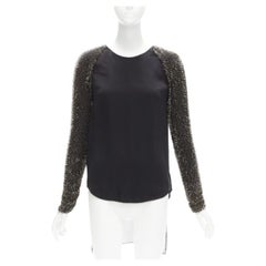 3.1 PHILLIP LIM top negro con mangas raglán y abalorios US2 S