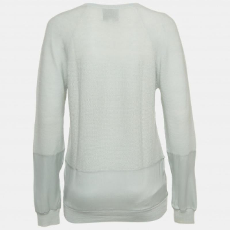 Dieser Pullover von 3.1 Phillip Lim ist ein Beispiel für die makellose Handwerkskunst des Labels - eine nahtlose Mischung aus Komfort, Luxus und Stil! Die Kreation aus Merinowolle hat lange Ärmel und Einsätze aus Seide.