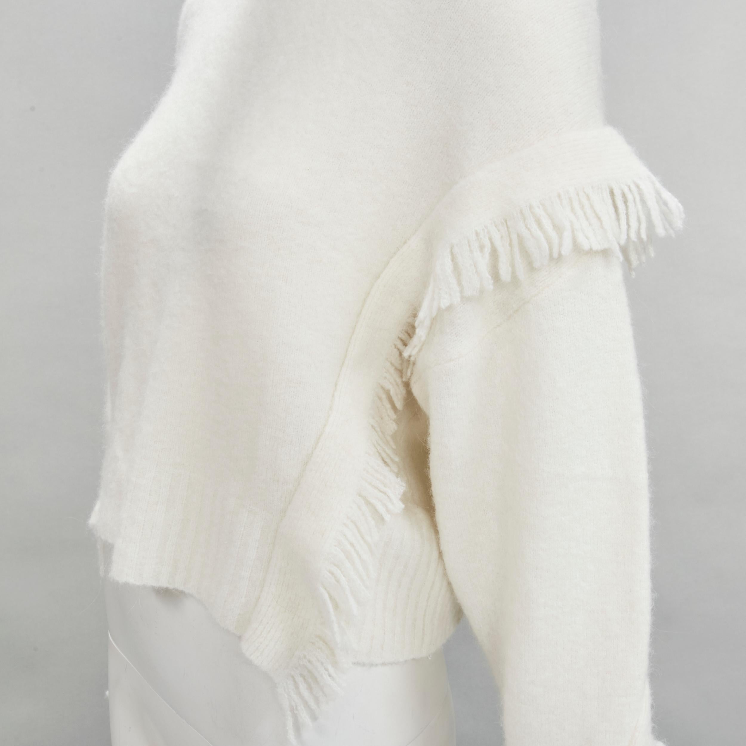 3.1 PHILLIP LIM cream soft alpaca wool blend fringe trim sweater XS
Brand: 3.1 Phillip Lim
Designer: Phillip Lim
Material: Polyamide
Color: Ecru
Pattern: Solid
Made in: China

CONDITION:
Condition: Excellent, this item was pre-owned and is in