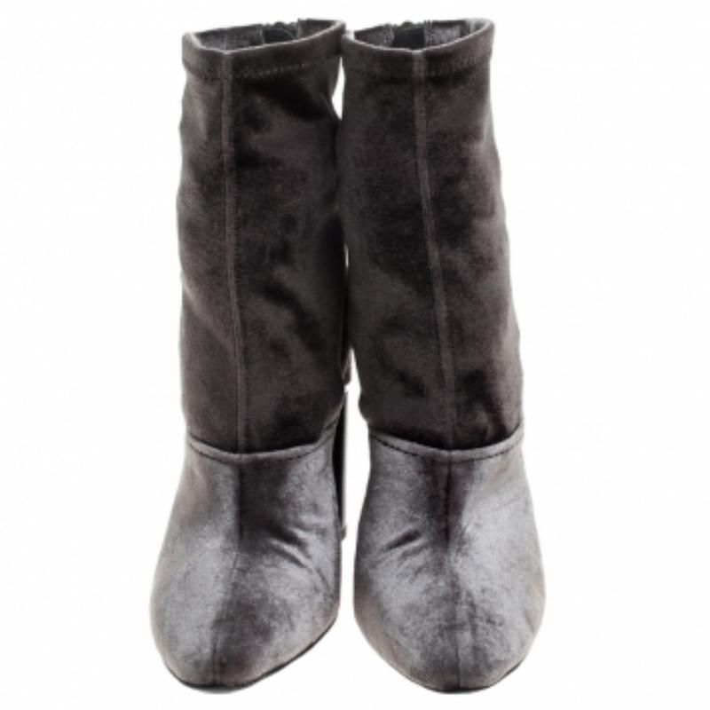 A pair of velvet boots to lend all the comfort and style in this world. These ankle boots have round toes, back zippers and block heels. 3.1 Phillip Lim brings you all the latest trends in fashion with this attractive pair. These boots exhibit a