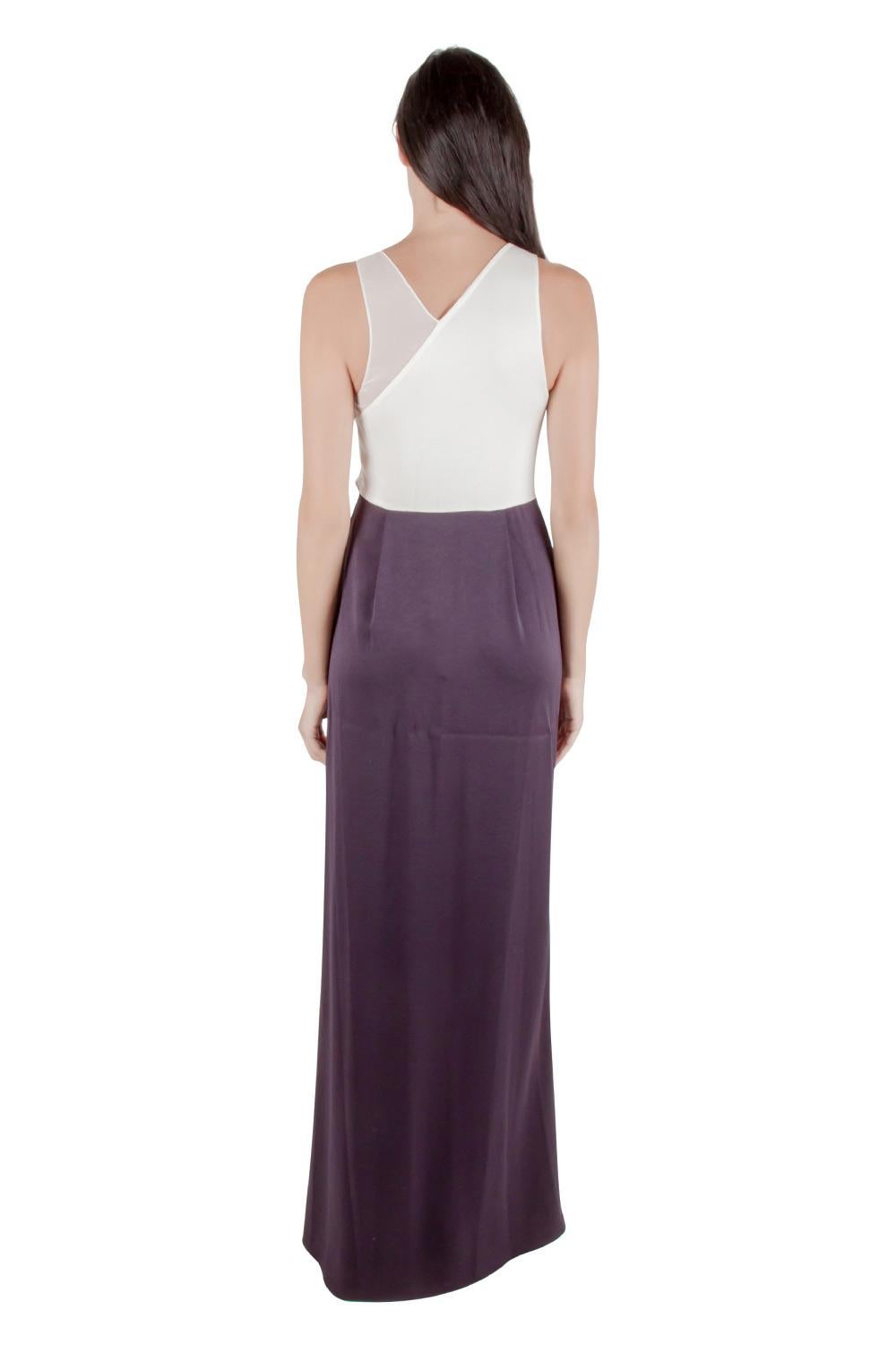 This pretty 3.1 Phillip gown features a draped bodice and a full-length bottom. It is styled in a sleeveless silhouette with an asymmetric neckline. Complete with two well-contrasting hues, you can team this evening gown with elegant heels and
