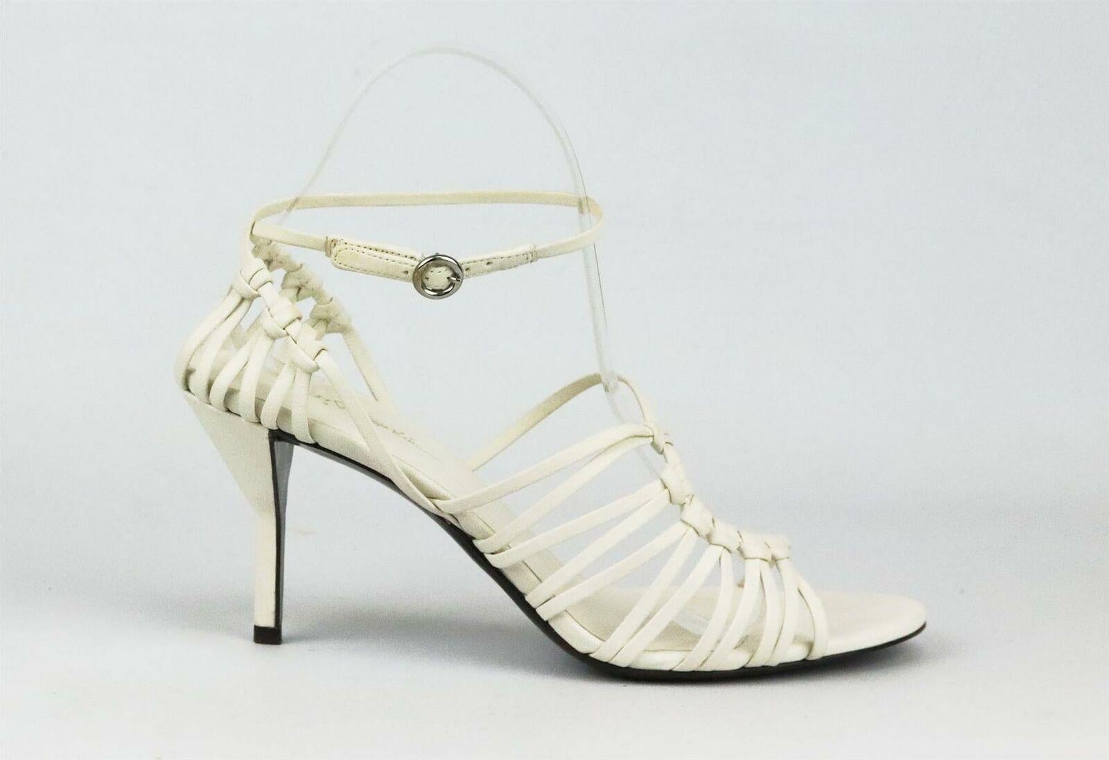 These Lily sandals by 3.1 Phillip Lim convey such a cool attitude and go with so many outfits, from summer dresses to smart tailoring, they're made from thin straps of supple ivory leather in an asymmetric silhouette and set on a slim, sculptural