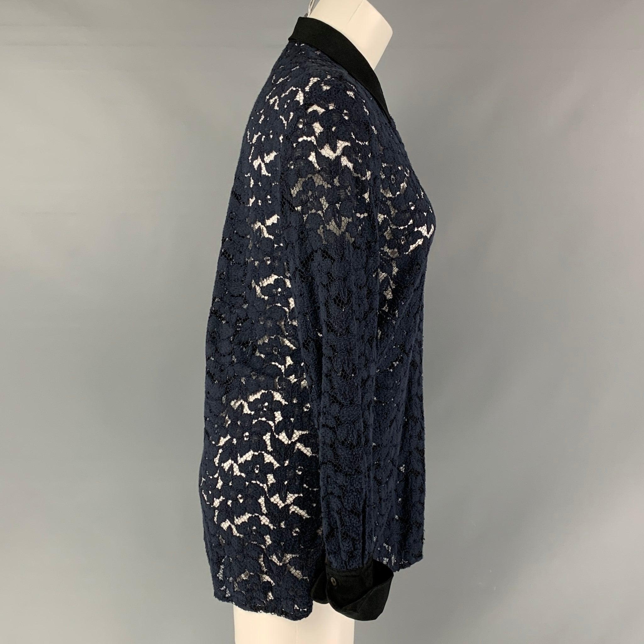3.1 PHILLIP LIM long sleeves shirt comes in navy lace featuring a straight collar, hidden placket, and button down closure.Excellent Pre-Owned Condition.  

Marked:   4 

Measurements: 
 
Shoulder: 16.5 inches Bust: 40 inches Sleeve: 25 inches