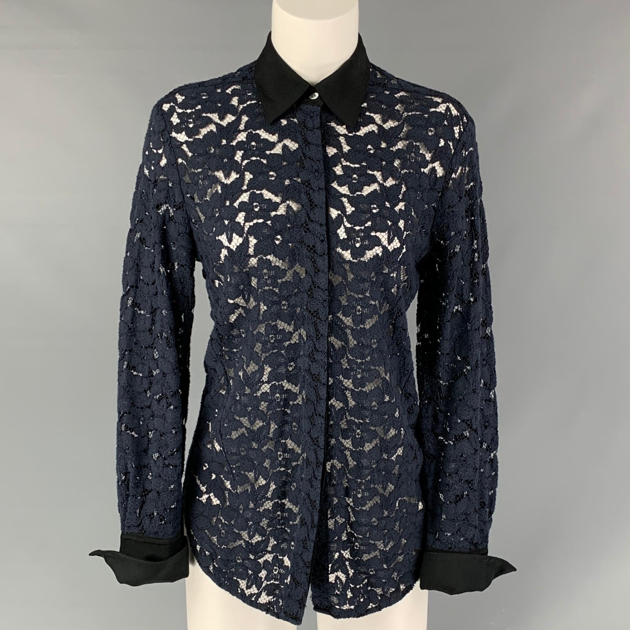 3.1 PHILLIP LIM long sleeves shirt comes in navy lace featuring a straight collar, hidden placket, and button down closure.

Excellent Pre-Owned Condition.
Marked: 4

Measurements:

Shoulder: 16.5 in.
Bust: 40 in.
Sleeve: 25 in.
Length: 27 in. 

