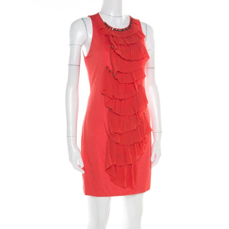 This sleeveless dress from Phillip Lim is perfect for the fashionable you! The orange creation is made of a cotton blend and features an artistic ruffle detailing on the front that is embellished with crystals. It flaunts a round neckline and comes