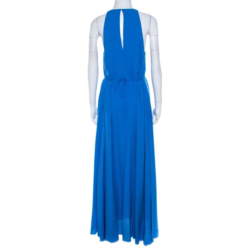 This maxi dress from 3.1 Phillip Lim is sure to up your stylish looks. It is crafted in luxurious chiffon silk to an elegant silhouette that is defined by pleat details, a halter neckline and a gathered waistline. Mirror the runway style by