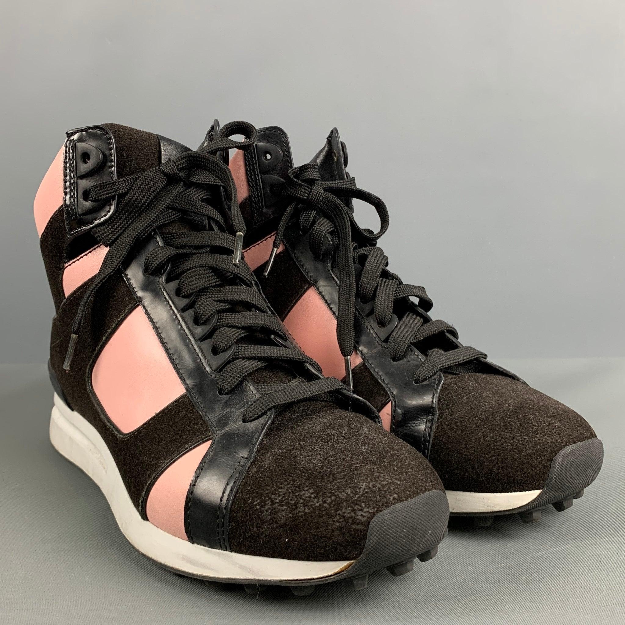 3.1 PHILLIP LIM sneakers comes in a black and pink leather featuring a wedge style, rubber sole, and a lace up closure.Very Good Pre-Owned Condition. 

Marked:   SHF4-T001FLT 39.5Outsole: 4 inches  x 11 inches  
  
  
 
Reference No.: