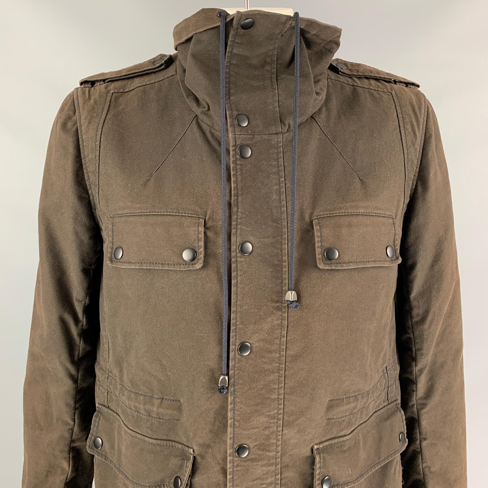 3.1 PHILLIP LIM coat comes in a brown cotton with a full liner featuring a high collar, utility style, front pockets, drawstring, epaulettes, and a snap button closure.
Very Good
Pre-Owned Condition. 

Marked:  L 

Measurements: 
 
Shoulder: 18.5