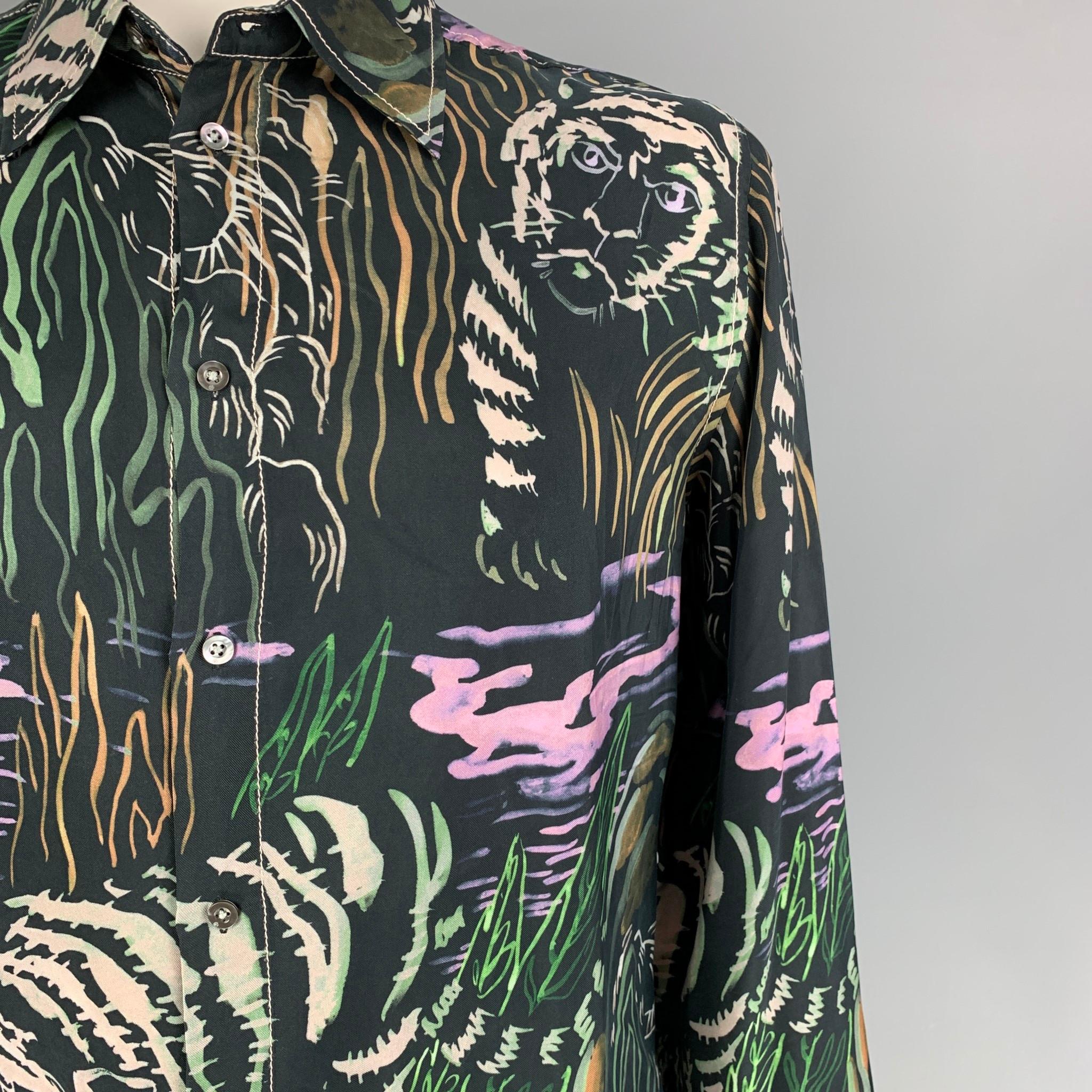 3.1 PHILLIP LIM long sleeve shirt comes in a multi-color print cupro featuring a pointed collar, contrast stitching,and a buttoned closure. 

Excellent Pre-Owned Condition.
Marked: L

Measurements:

Shoulder: 18.5 in.
Chest: 46 in.
Sleeve: 26