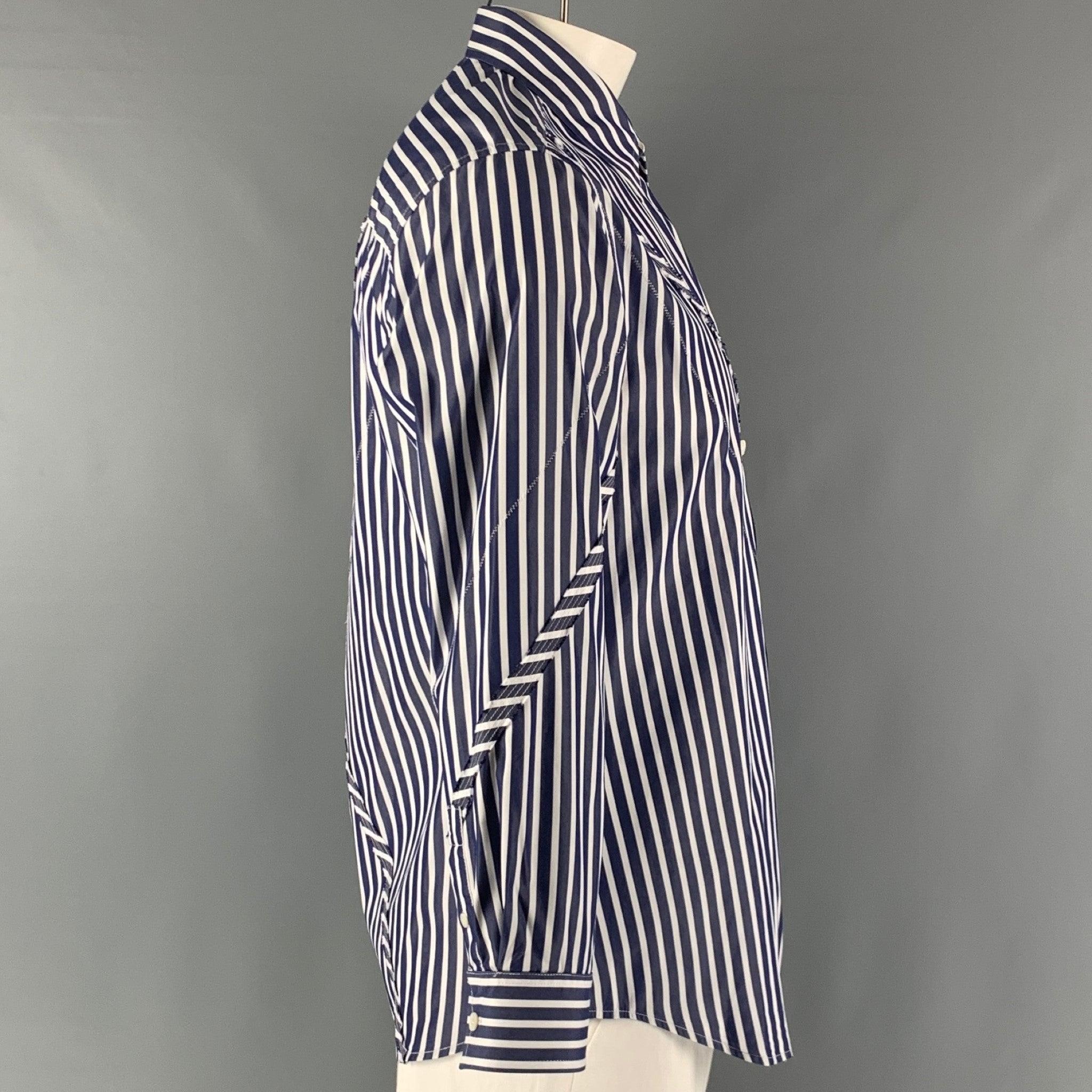 3.1 PHILLIP LIM long sleeve shirt comes in blue and white striped woven material featuring a button up style, contrast top stitching details, and a straight collar. Excellent Pre-Owned Condition. 

Marked:   L 

Measurements: 
 
Shoulder: 18 inches