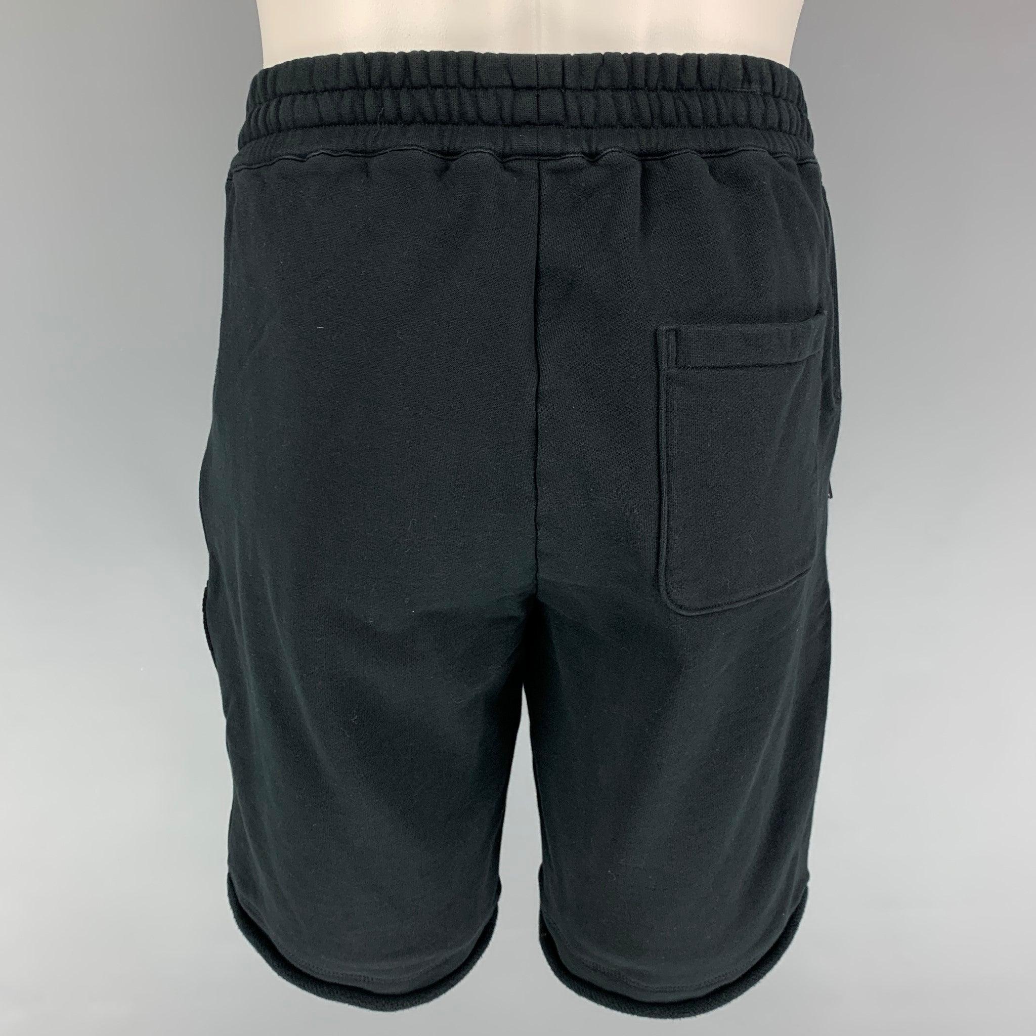 3.1 PHILLIP LIM shorts comes in a black cotton featuring a elastic waistband, zipper pockets, and a drawstring.
 Very Good
 Pre-Owned Condition. 
 

 Marked:  S 
 

 Measurements: 
  Waist: 28 inches Rise: 12.5 inches Inseam: 9.5 inches 
  
  
  
