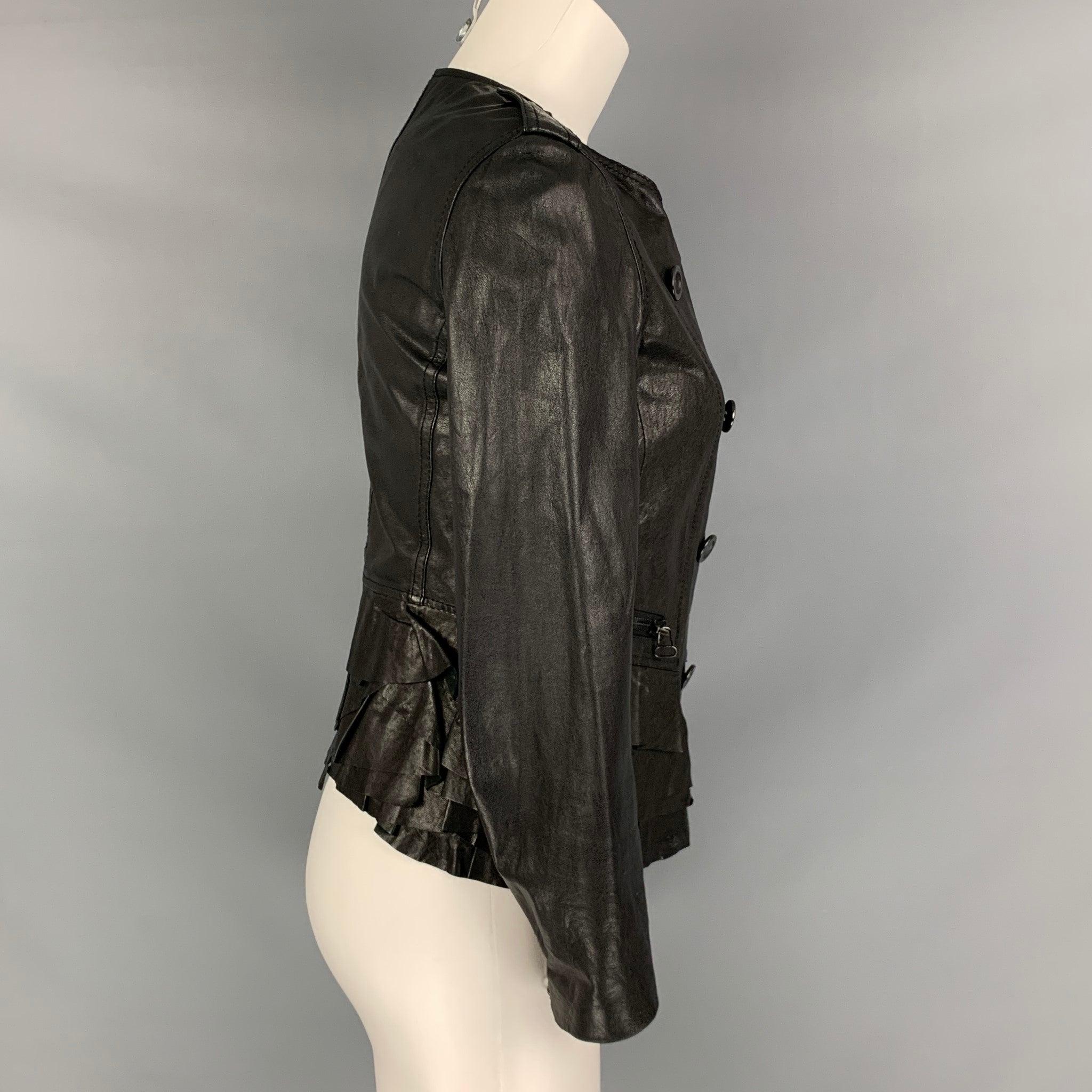 3.1 PHILLIP LIM jacket comes in a black leather featuring a motorcycle style, double breasted, epaulettes, ruffles detail at bottom back, and a zip up closure. Very Good Pre- Owned Conditions. 

Marked:   2 

Measurements: 
 
Shoulder: 15 inches