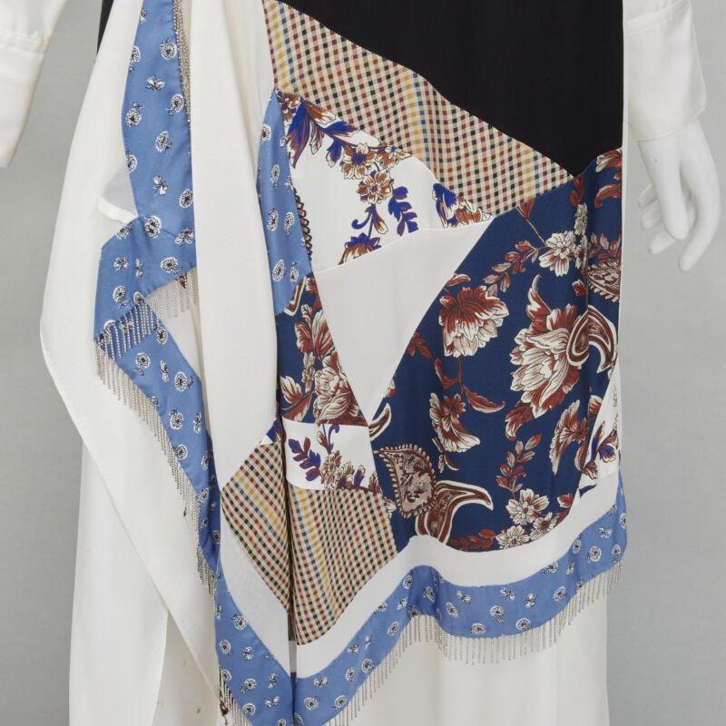 3.1 PHILLIP LIM white silk oriental print metal chain tassel wrap dress US2 S
Reference: KNLM/A00128
Brand: 3.1 Phillip Lim
Designer: Phillip Lim
Material: Silk
Color: White, Blue
Pattern: Floral
Closure: Button
Extra Details: Regular silk shirt