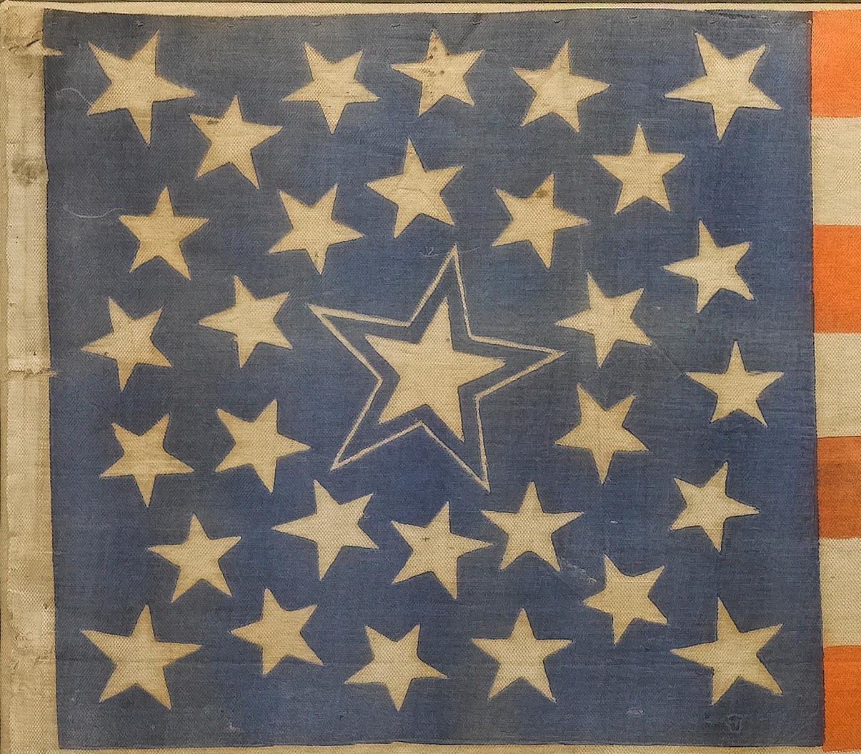 This is a rare 31-star medallion American flag, celebrating the addition of California to the Union.

The flag is printed on cotton, and has a spectacularly unique star pattern. A double medallion of dancing stars surrounds a large haloed inner