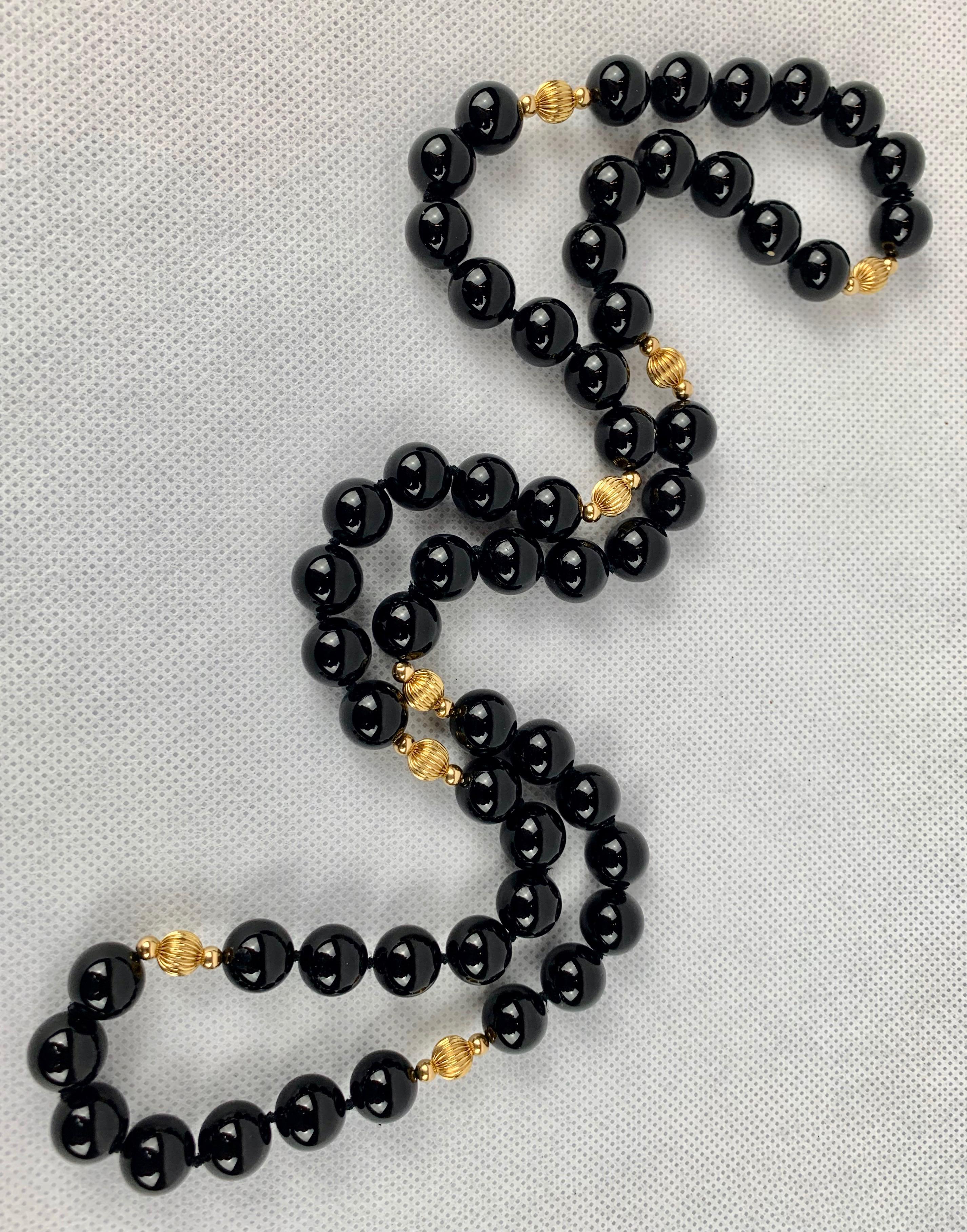 Strand of Black Onyx and 14 Karat Gold Spacers In Good Condition In West Palm Beach, FL