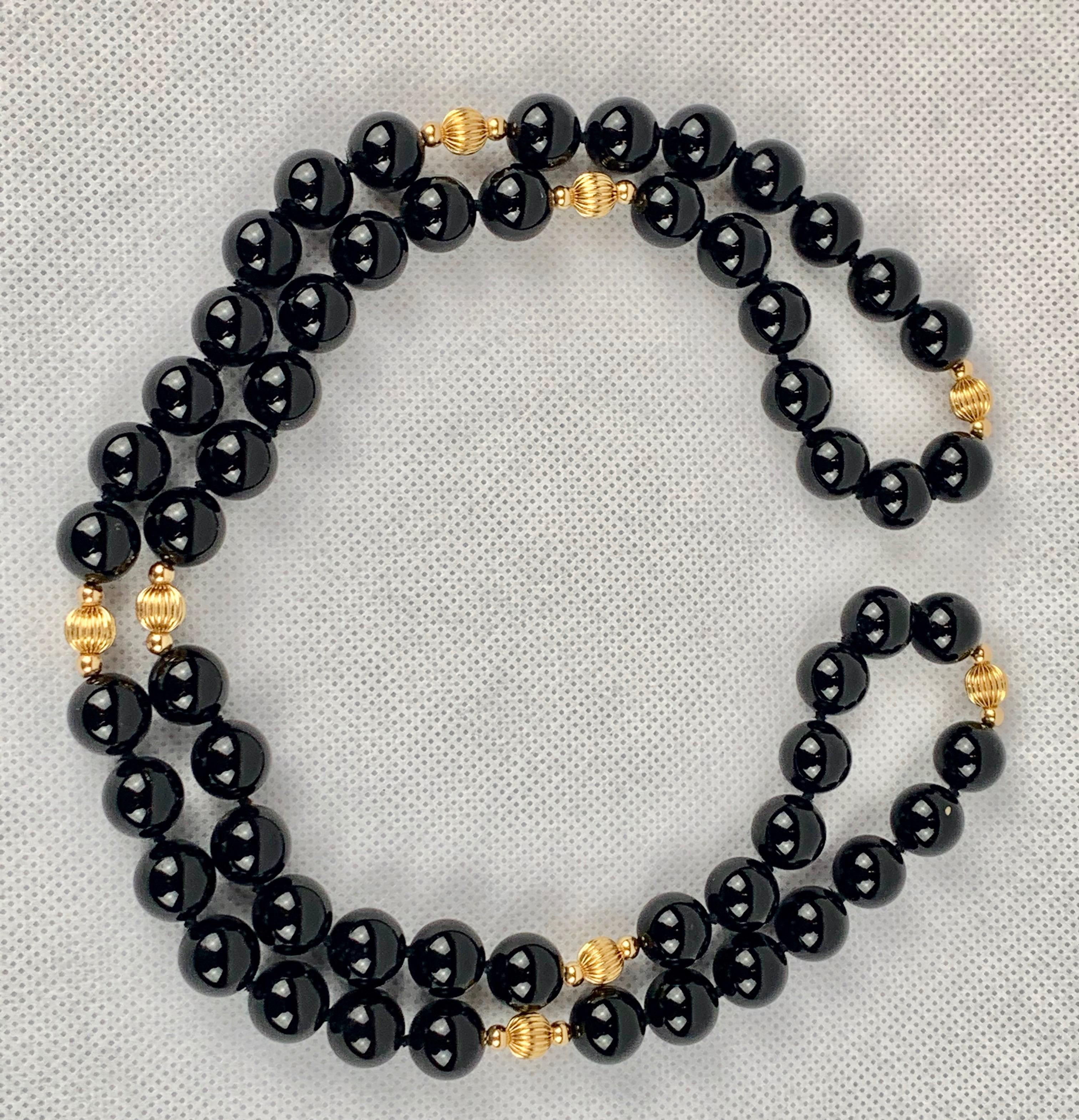 Women's Strand of Black Onyx and 14 Karat Gold Spacers