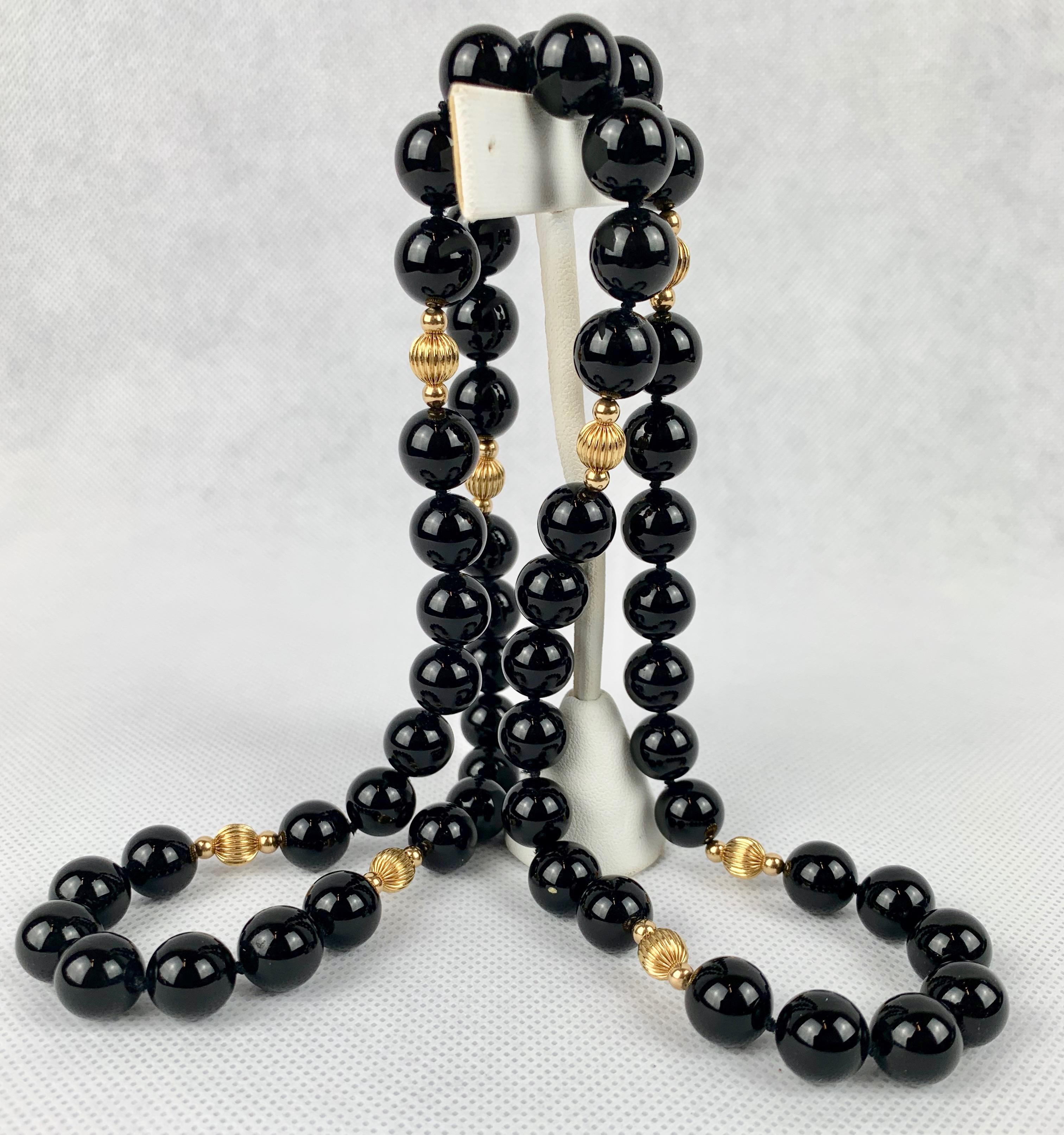 Strand of Black Onyx and 14 Karat Gold Spacers 2