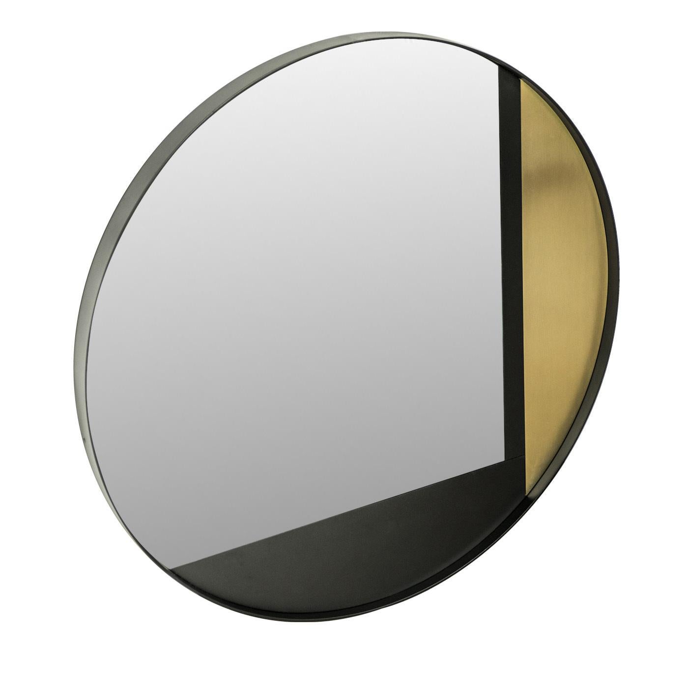 This exquisite round wall mirror is framed in metal and decorated with geometric inserts in wood and solid brass. The round shape harmoniously coexists with the straight lines that cut the mirror making it a contemporary art deco piece.
 