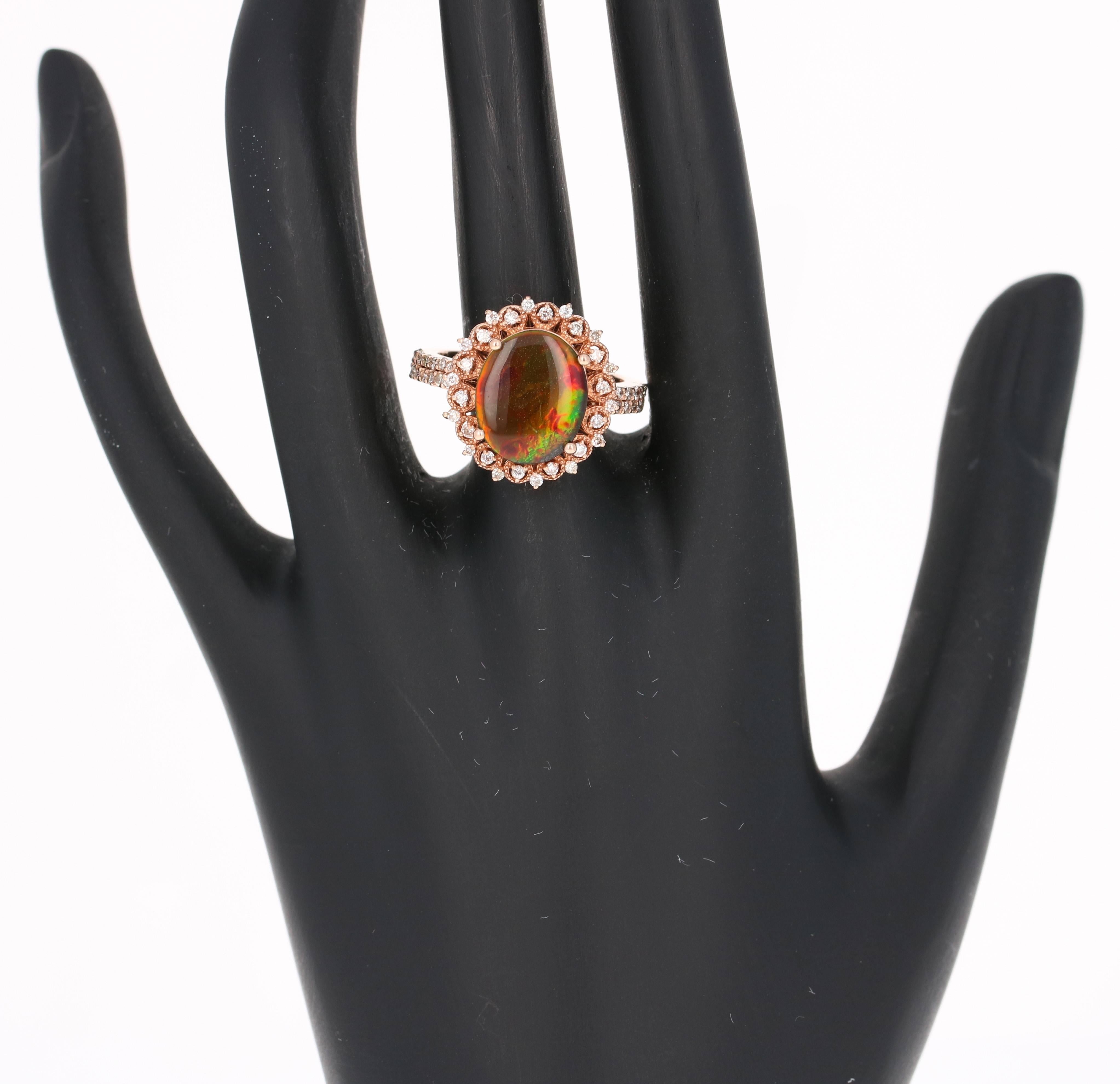 Taille ovale Bague cocktail en or rose 14 carats avec diamants et Ammolite de 3,10 carats en vente