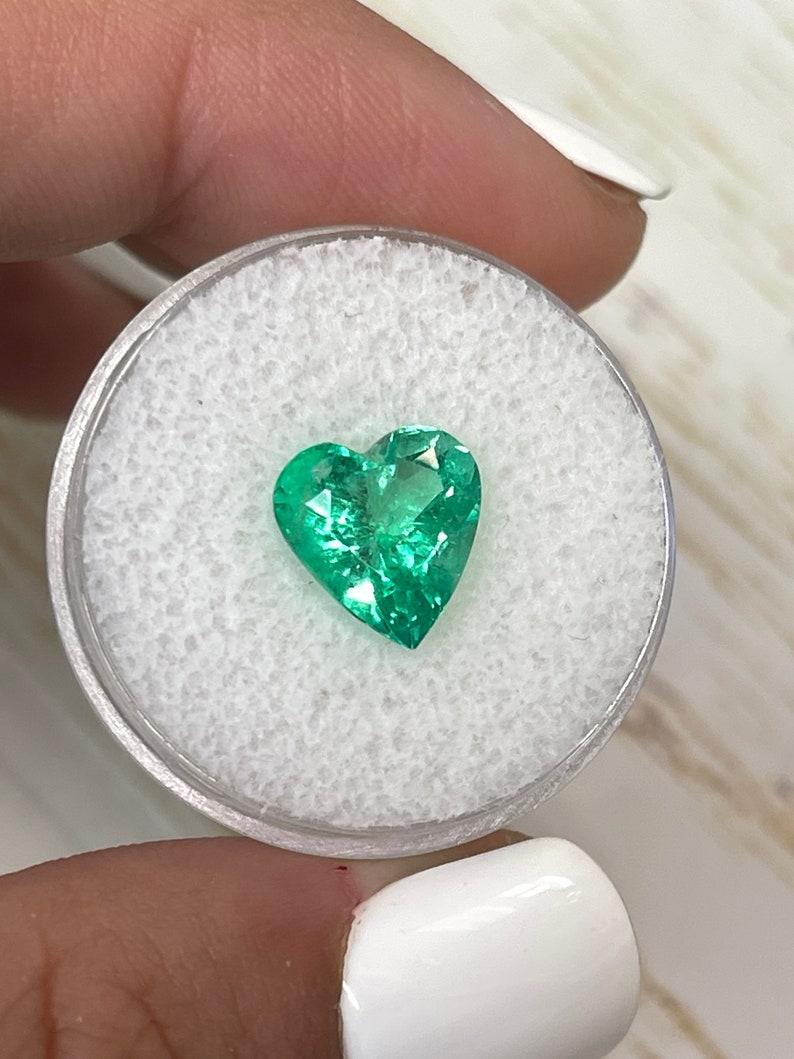 Modern 3.10 Carat Heart-Cut Colombian Emerald  Yellowish Green 10.2x9.8 Loose Gemstone For Sale