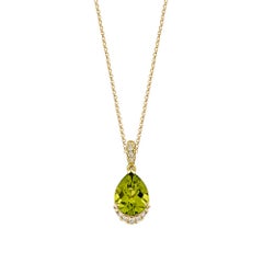 Sunita Nahata Peridot 3.10ct. Pendant in 18Karat Yellow Gold with Diamond.
