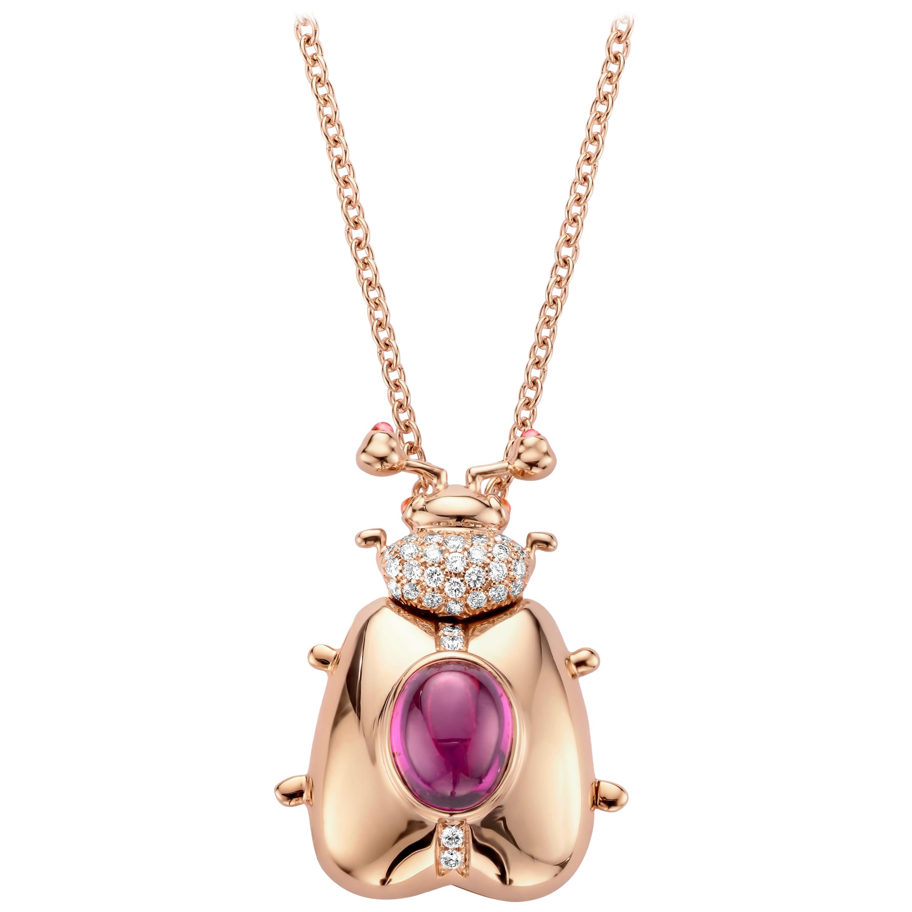 One of a kind lucky beetle necklace in 18 Karat rose gold 16g set with the finest diamonds in brilliant cut 0,31Ct (VVS/DEF quality) and one natural, royal purple garnet in oval cabochon cut 3,10Ct. 

The feelers and the eyes of this adorable