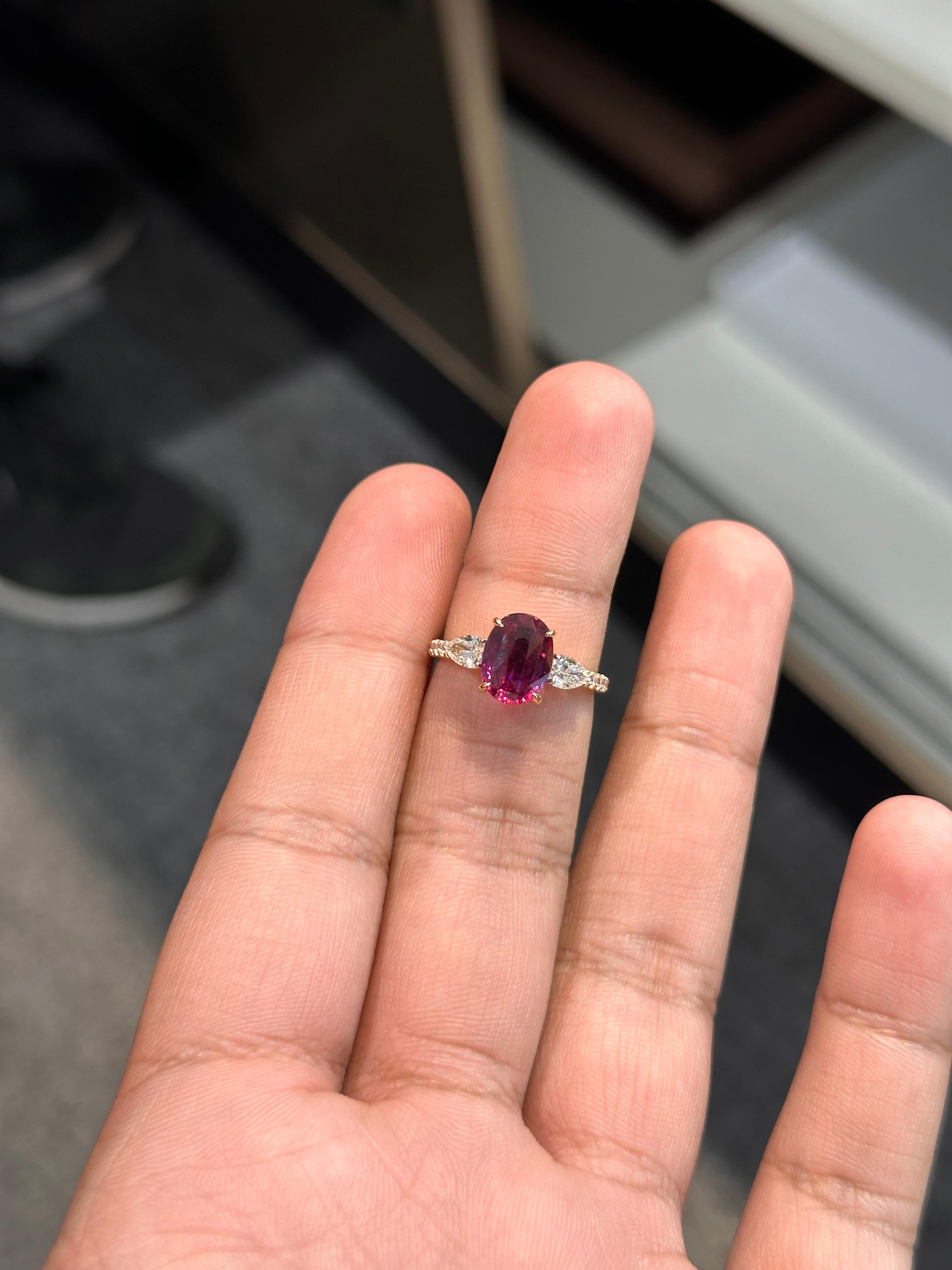 A rare and refined treasure, this elegant ring features a 3.10 carat natural Mozambique ruby, prized for its deep,purple hue and exceptional clarity. What makes this ruby truly extraordinary is its no-heat certification — a testament to its natural