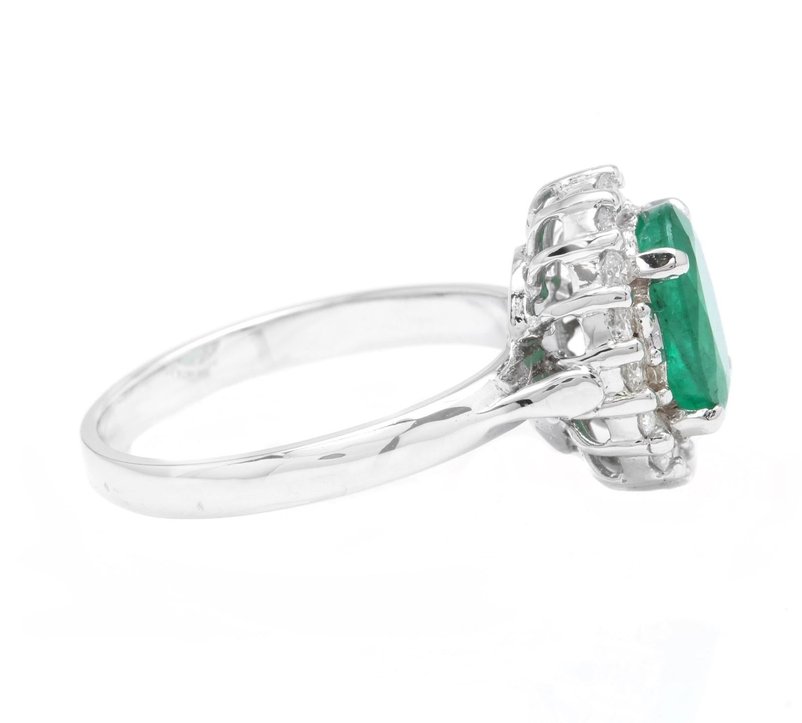 Emerald Cut 3.10 Carat Exquisite Emerald and Diamond 14 Karat Solid White Gold Ring For Sale