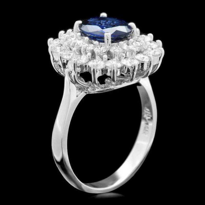 3.10 Carats Natural Blue Sapphire and Diamond 14K Solid White Gold Ring

Total Blue Sapphire Weight is: Approx. 1.70 Carats

Sapphire Measures: Approx. 9.00 x 7.00mm

Sapphire treatment: Diffusion

Natural Round Diamonds Weight: Approx. 1.40 Carats