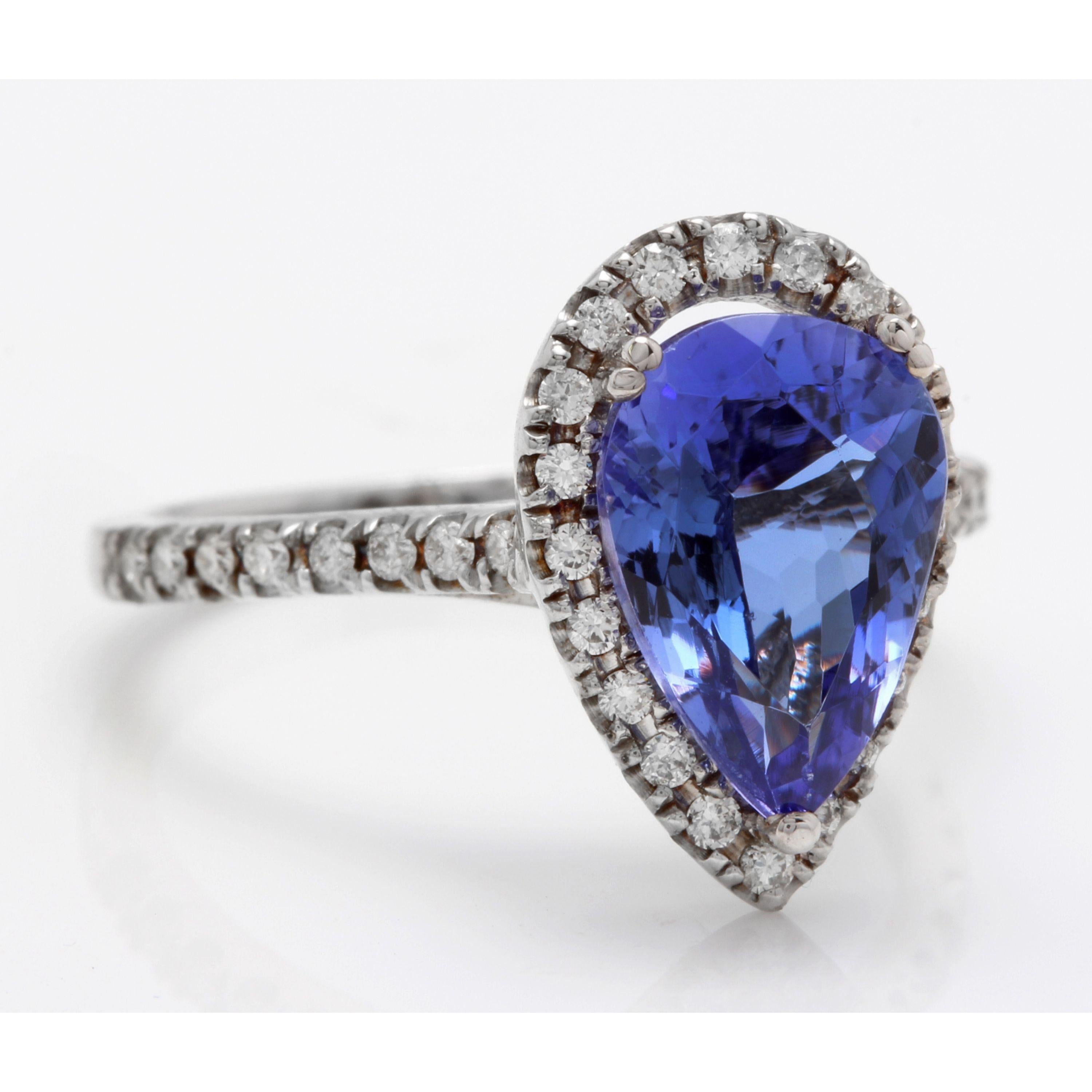 3.10 Carats Natural Very Nice Looking Tanzanite and Diamond 14K Solid White Gold Ring

Total Natural Pear Shaped Tanzanite Weight is: Approx. 2.70 Carats

Tanzanite Measures: Approx. 11.50 x 7.65mm

Natural Round Diamonds Weight: 0.40 Carats (color