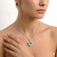 Collana in oro bianco con diamante rotondo e acquamarina da 31.03 carati