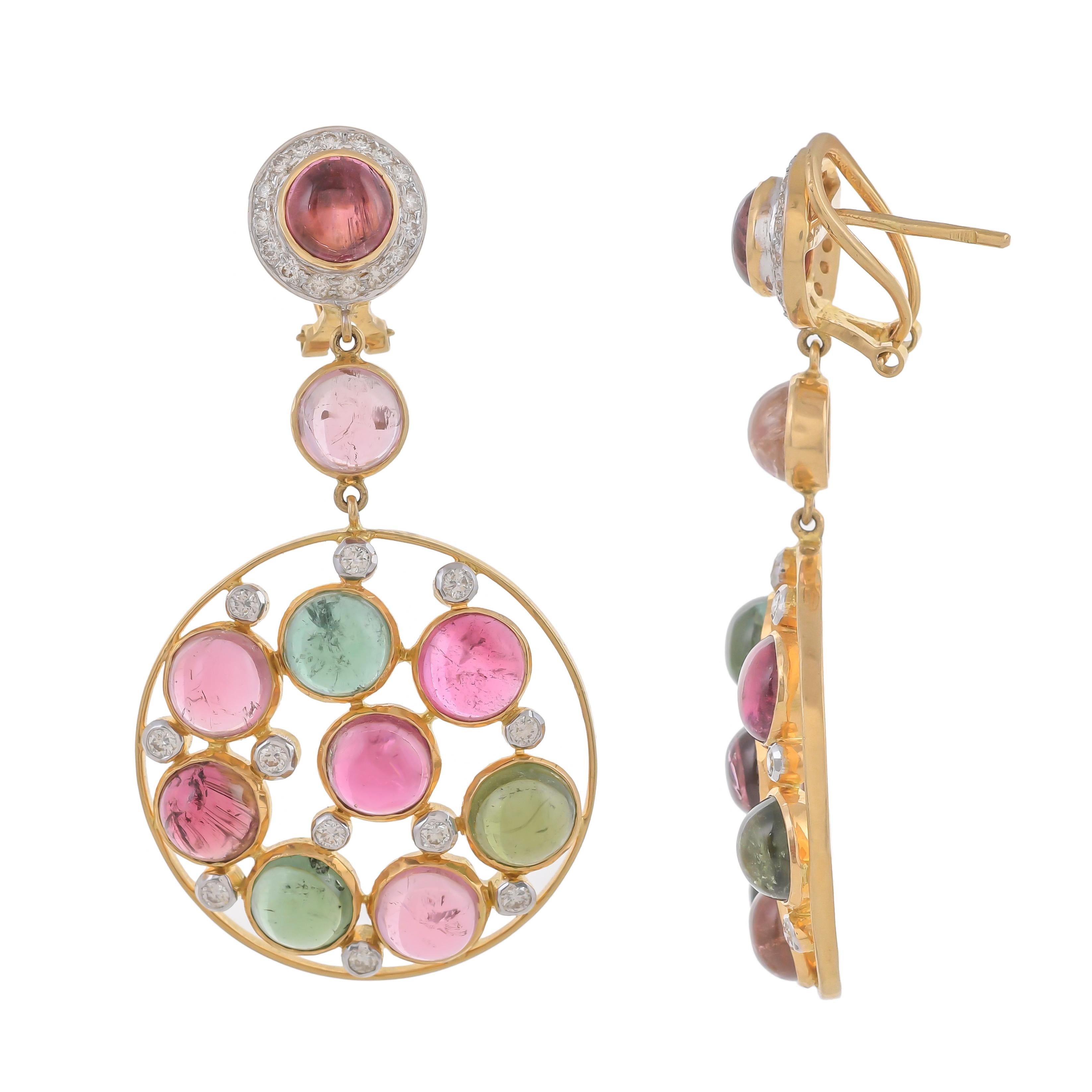 These rigid gold earrings of circular form decorated with 8 round multi-tourmaline alternated with round sparkling white diamonds suspended from a round pink tourmaline cabochon, to a surmount of a round-shaped tourmaline with a diamond set surround