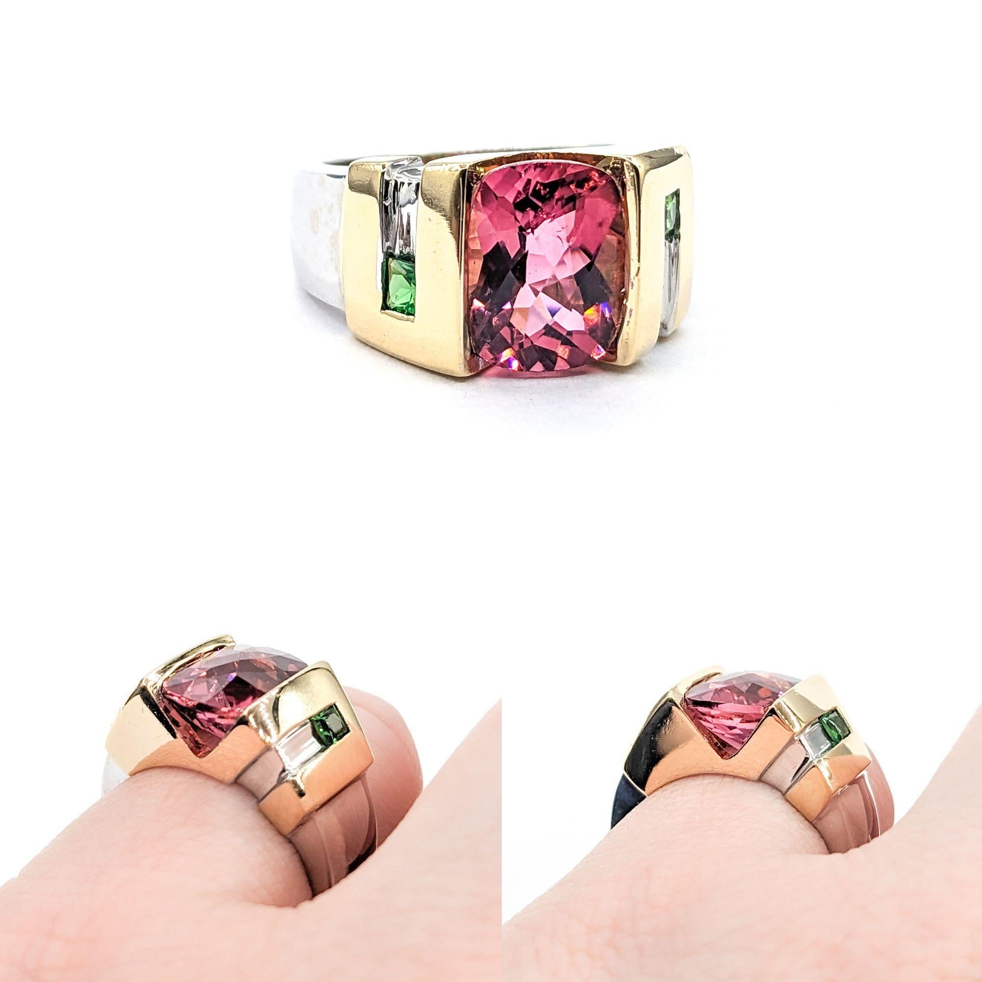 3.10ct cushion Pink Tourmaline & .18ctw Tsavorite Garnets Ring In Two-Tone Gold

Introducing a beautiful Gemstone Fashion Ring, exquisitely crafted in 14ktt Two-tone Gold. This distinctive piece features a dazzling3.10ct cushion Pink Tourmaline