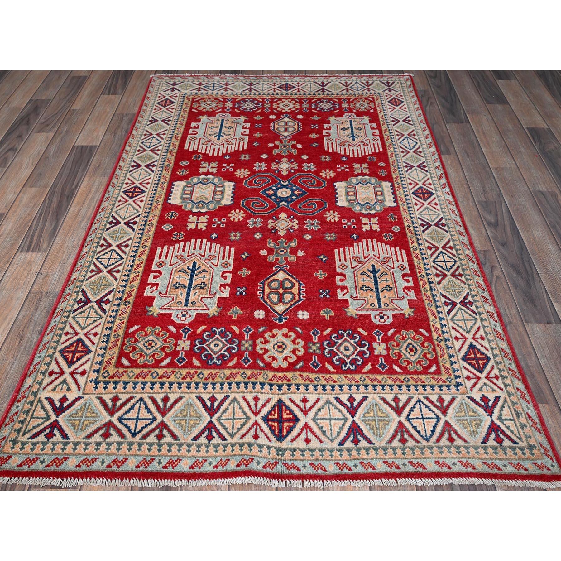 Arsenal Red, Kazak with All Over Tribal Motifs, Hand Knotted, Vegetable Dyes, Denser Weave, Pure Wool, Oriental Rug
Primary materials: Wool
Latex: No Pile 
height: 0.25 Inches
Style: Traditional
Primary color: Red
Secondary colors: Navy Blue, Light
