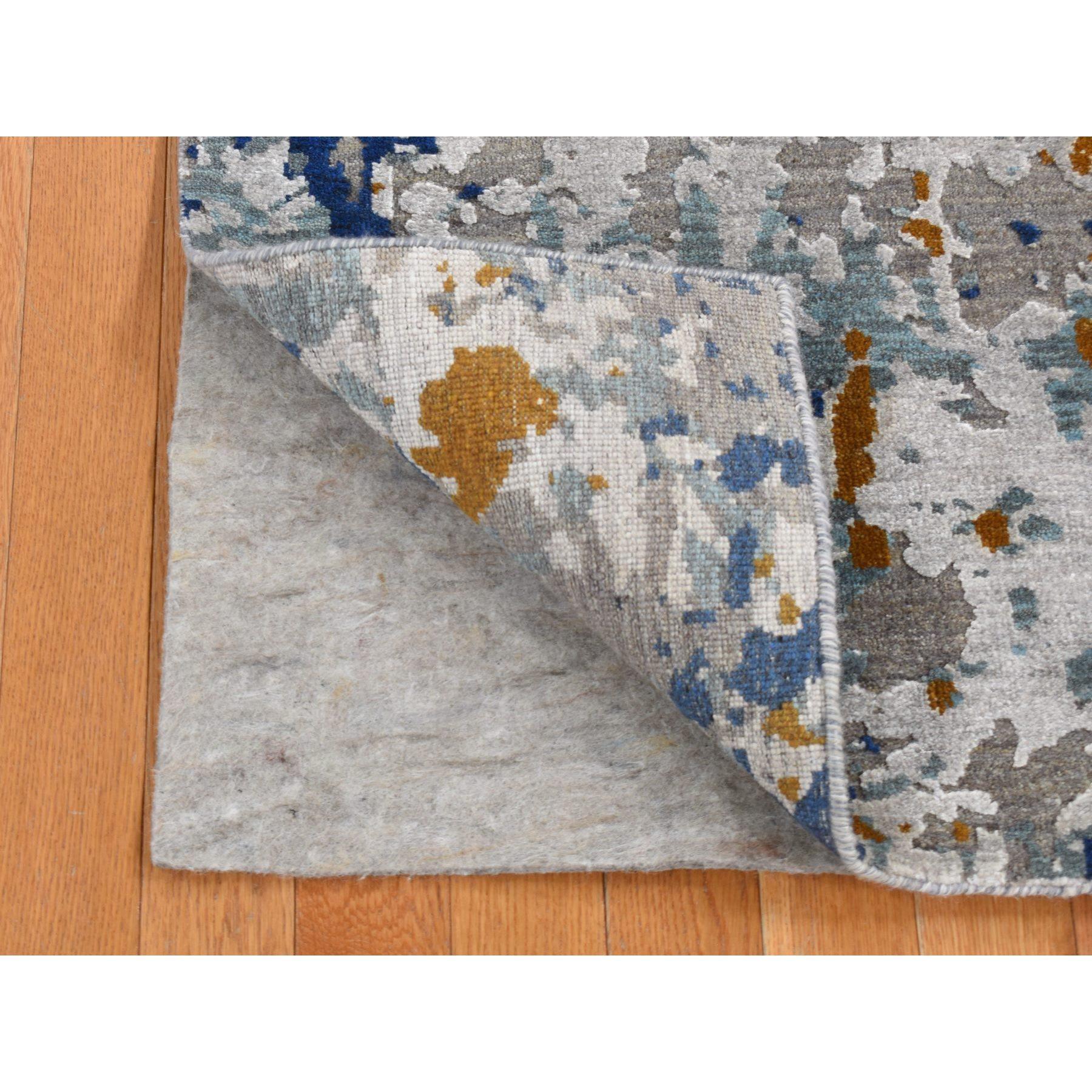 Battleship Gray, Modern Abstract Galaxy Design, Wool and Silk, Hi-Low Pile, Hand Knotted, Oriental Rug
Primary materials: Wool & Silk
Latex: No Pile 
height: 0.25 Inches
Style: Transitional
Primary color: Grey
Secondary colors: Yale Blue, Yellow,