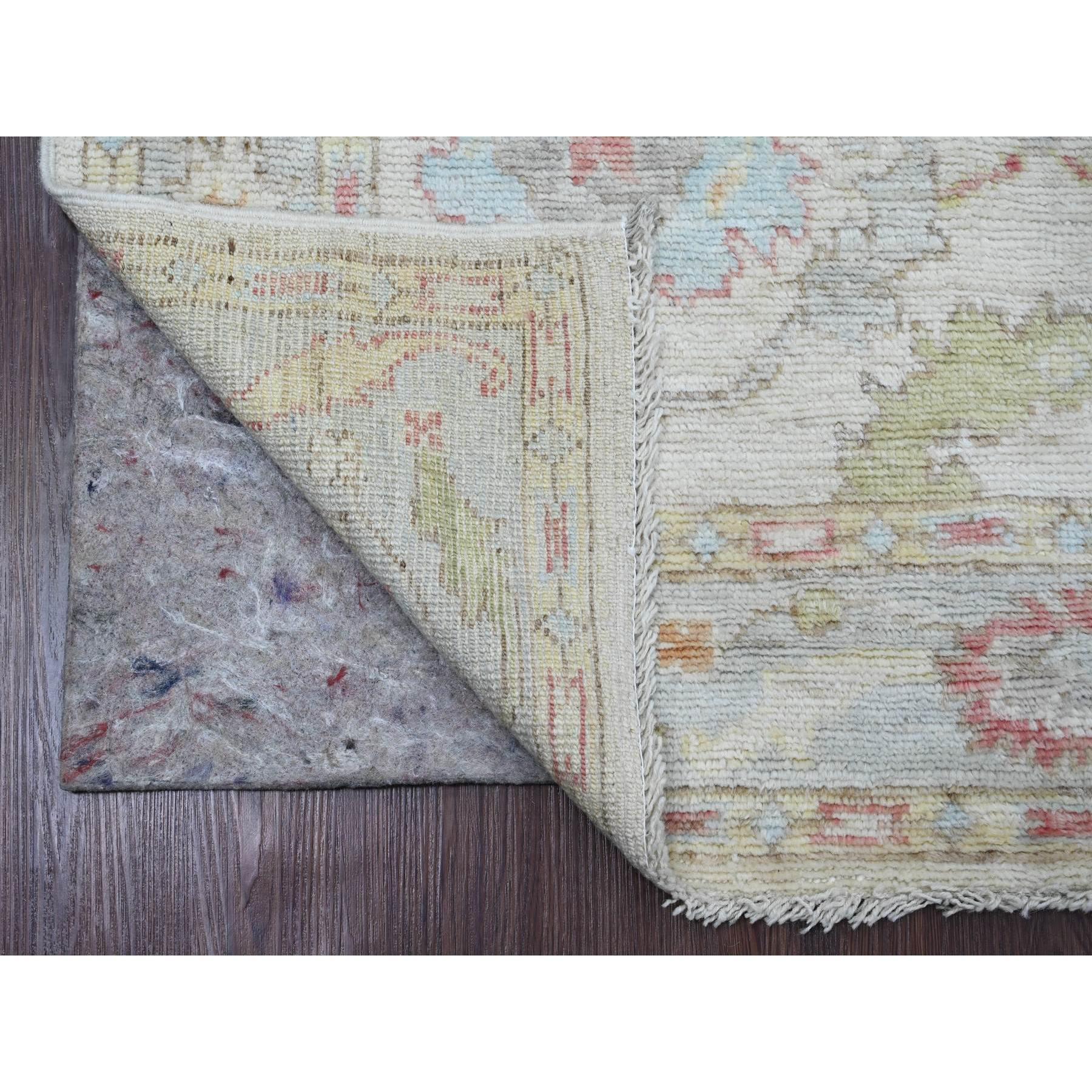 Whisper White, Hand Knotted, Afghan Angora Oushak with Large Leaf Design, Vegetable Dyes, 100% Wool, Oriental Rug
Primary materials: Wool
Latex: No Pile 
height: 0.25 Inches
Style: Transitional
Primary color: Ivory
Secondary colors: Red, Green,