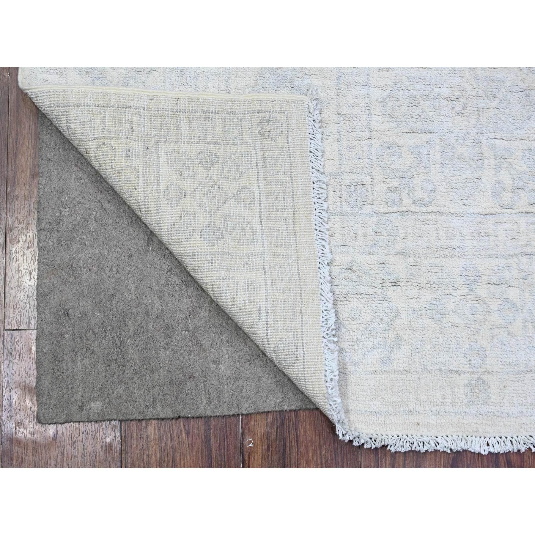 This is a truly genuine one-of-a-kind White Wash Peshawar with Khotan Design Oriental Rug. It has been Knotted for months and months in the centuries-old weaving craftsmanship techniques by expert artisans.
Primary materials: Wool
Latex: No Pile