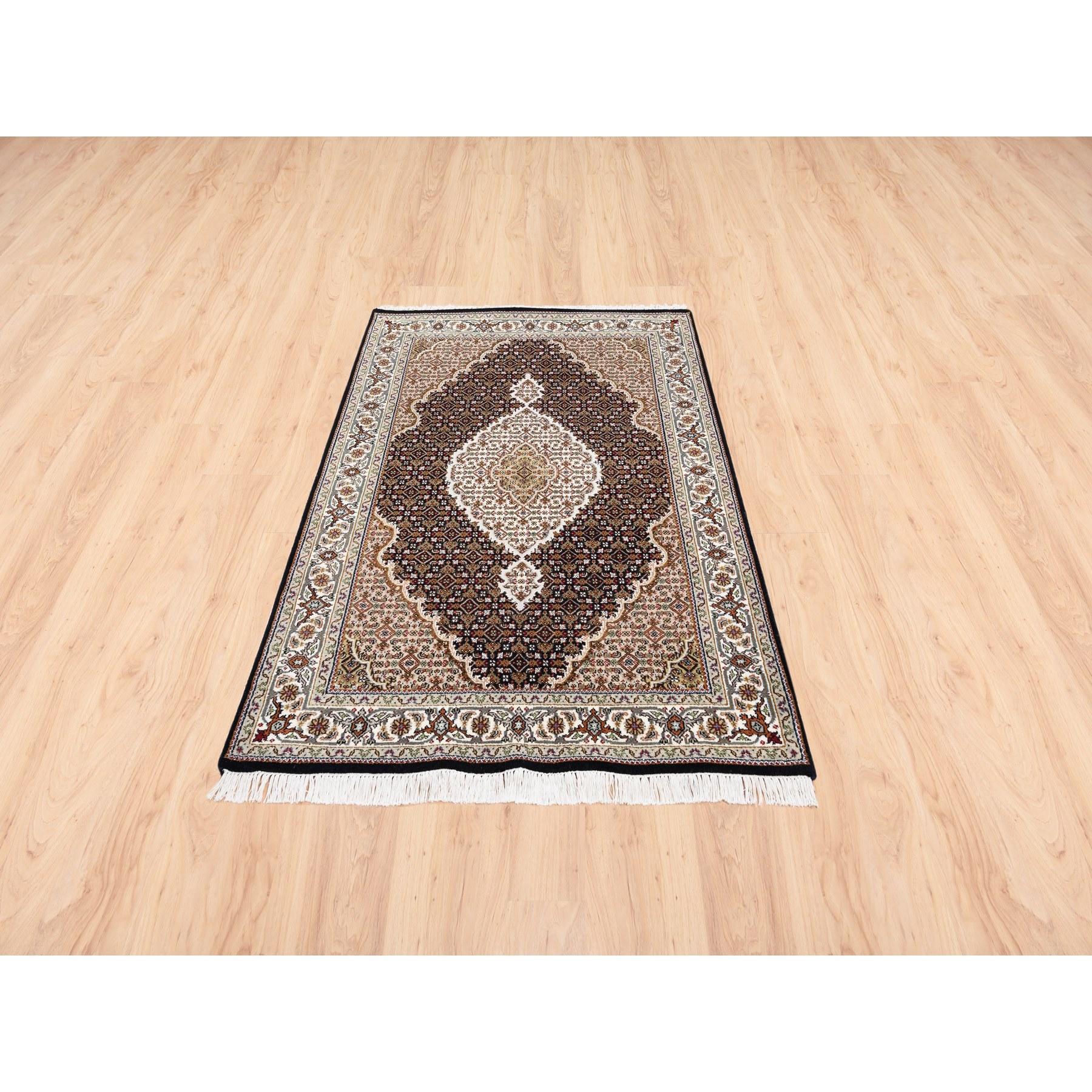 This is a truly genuine one-of-a-kind Hand Knotted Black Tabriz Mahi Fish Medallion Design Wool Oriental Rug. It has been Knotted for months and months in the centuries-old Persian weaving craftsmanship techniques by expert artisans.
Primary