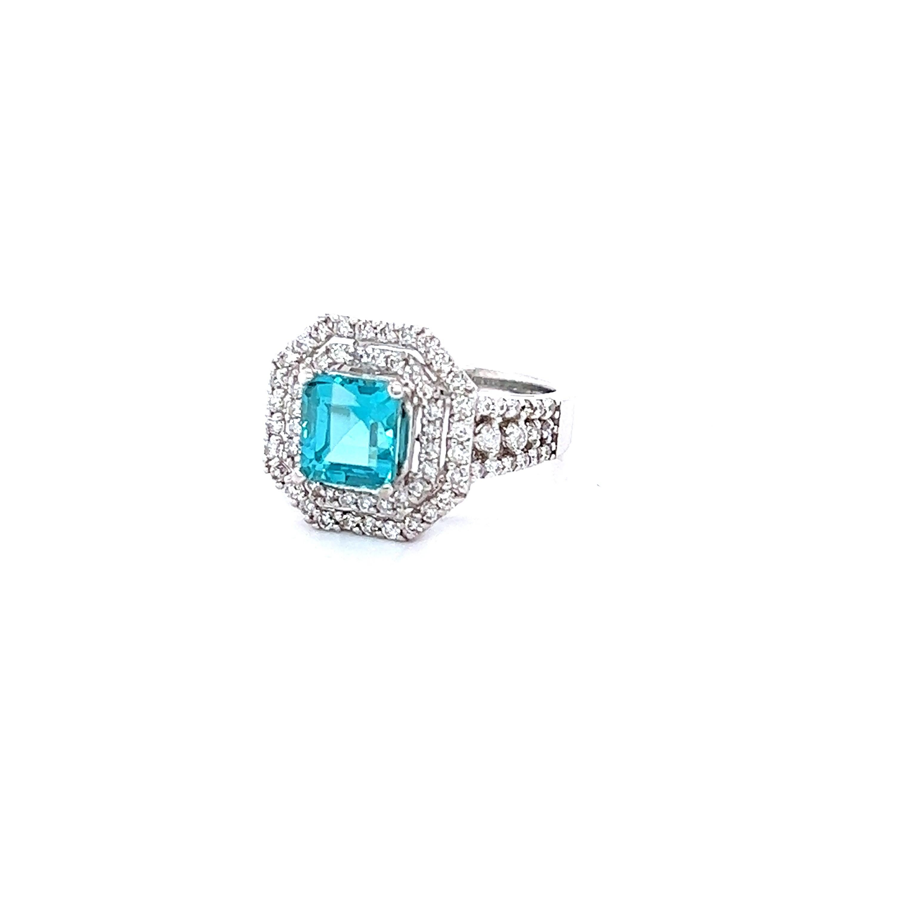 This ring has a 2.22 carat Natural Square Cut Apatite in the center of the ring and is surrounded by 84 Natural Round Cut Diamonds that weigh 0.89 carats. The clarity and color of the diamonds are SI1-F. The total carat weight of the ring is 3.11