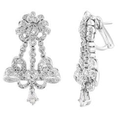 Boucles d
oreilles pendantes en or blanc 18 carats et diamants de 3,11 carats