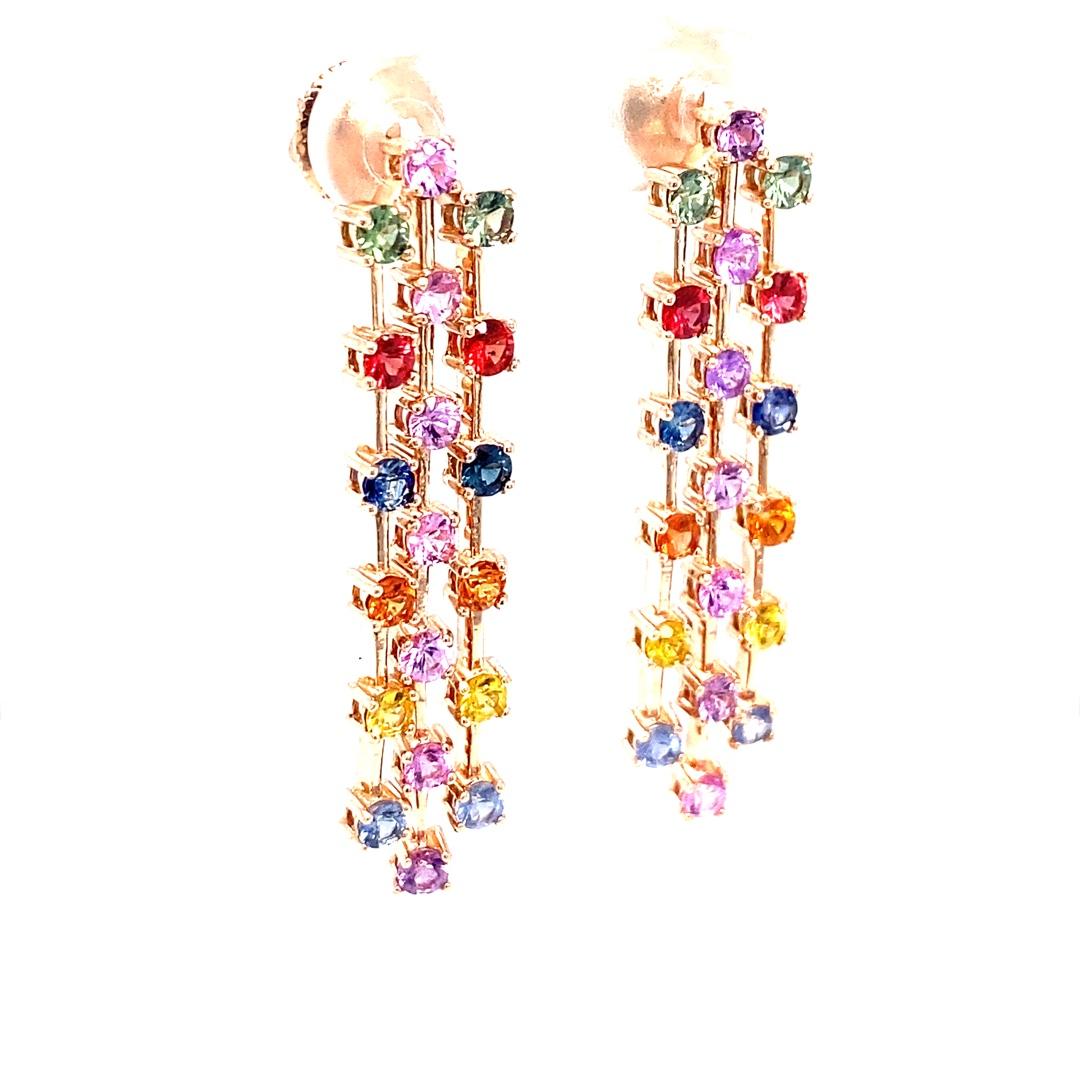 These earrings have Natural Multi Color Sapphires that weigh 3.11 carats. The sapphires range in hues of Pink, Green, Blue, Yellow, Red and Orange.
They are set in 14 Karat Yellow Gold with an approximate weight of 6.0 grams
The earrings are 1.5