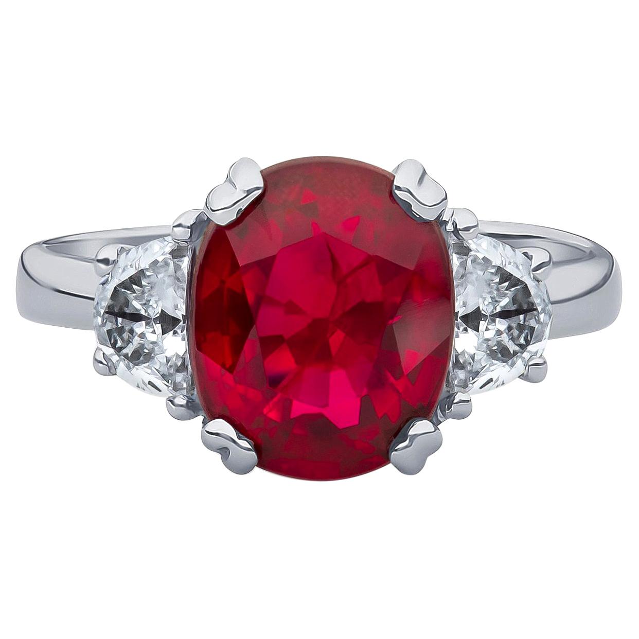 3.11 Carat Oval Cut Natural Thai Ruby Ring with 0.50 Carat Total of Diamonds For Sale