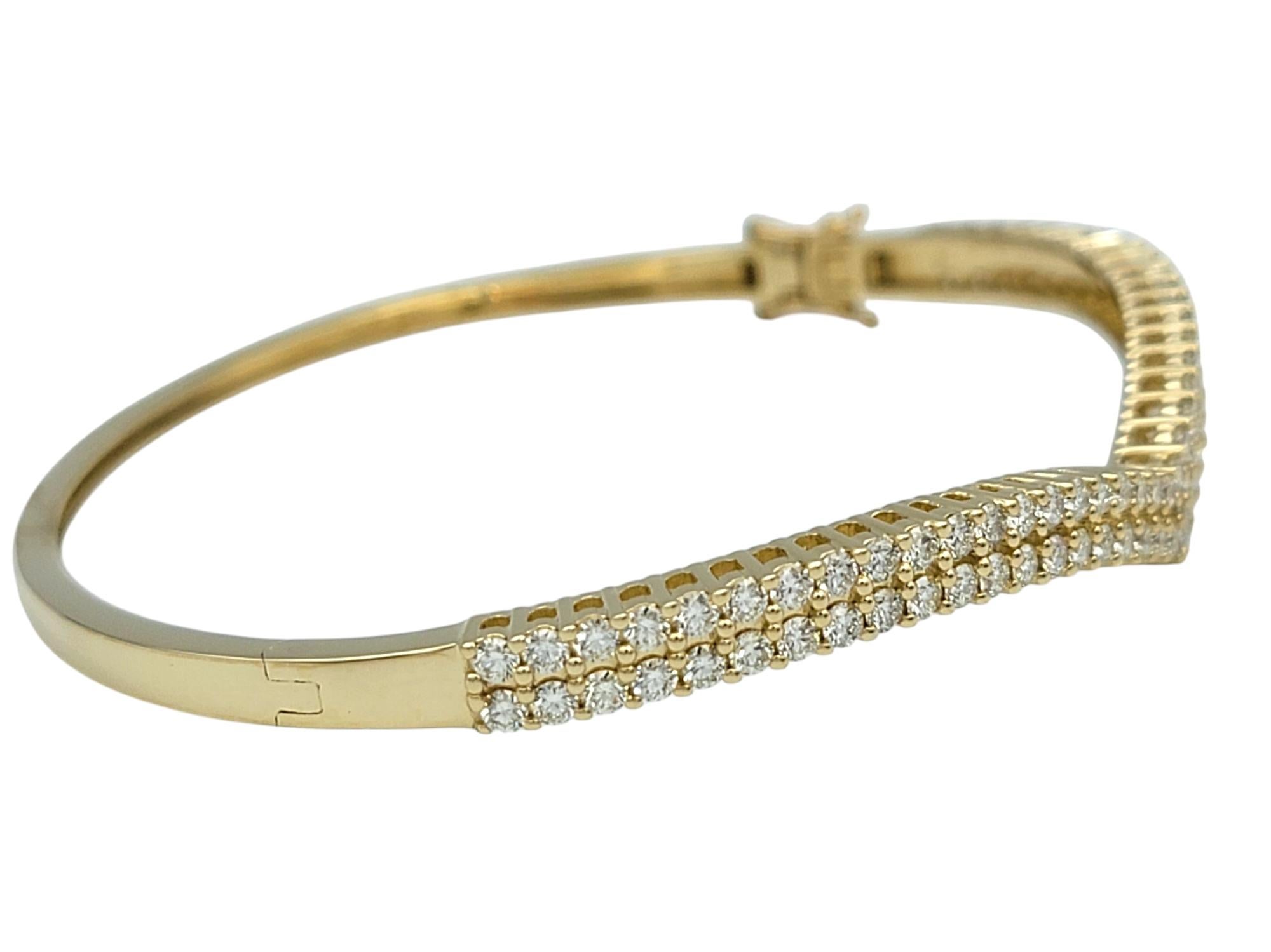 Contemporary 3.11 Carat Total Double Row Diamond Chevron Bangle Bracelet in 14 Karat Gold For Sale