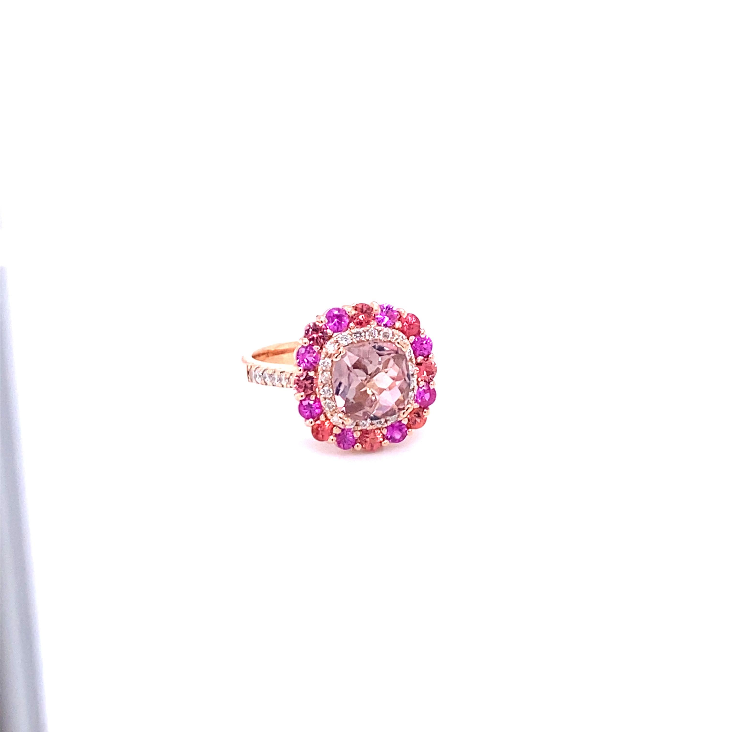 Pink Tourmaline Sapphire Diamond Rose Gold Statement Ring

This Ring has a Cushion Checkered Cut Tourmaline that weighs 1.72 carats and 16 Multi Sapphires that weigh 1.04 Carats. There are also 32 Round Cut Diamonds that weigh 0.35 Carats.  The