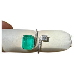 3.11 Ct Emerald Cut Emerald & 0.49 Ct Diamond Bypass Ring in 18 Kt Gold Size 6