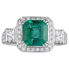 3.11ct Emerald Cut Green Emerald Engagement Ring