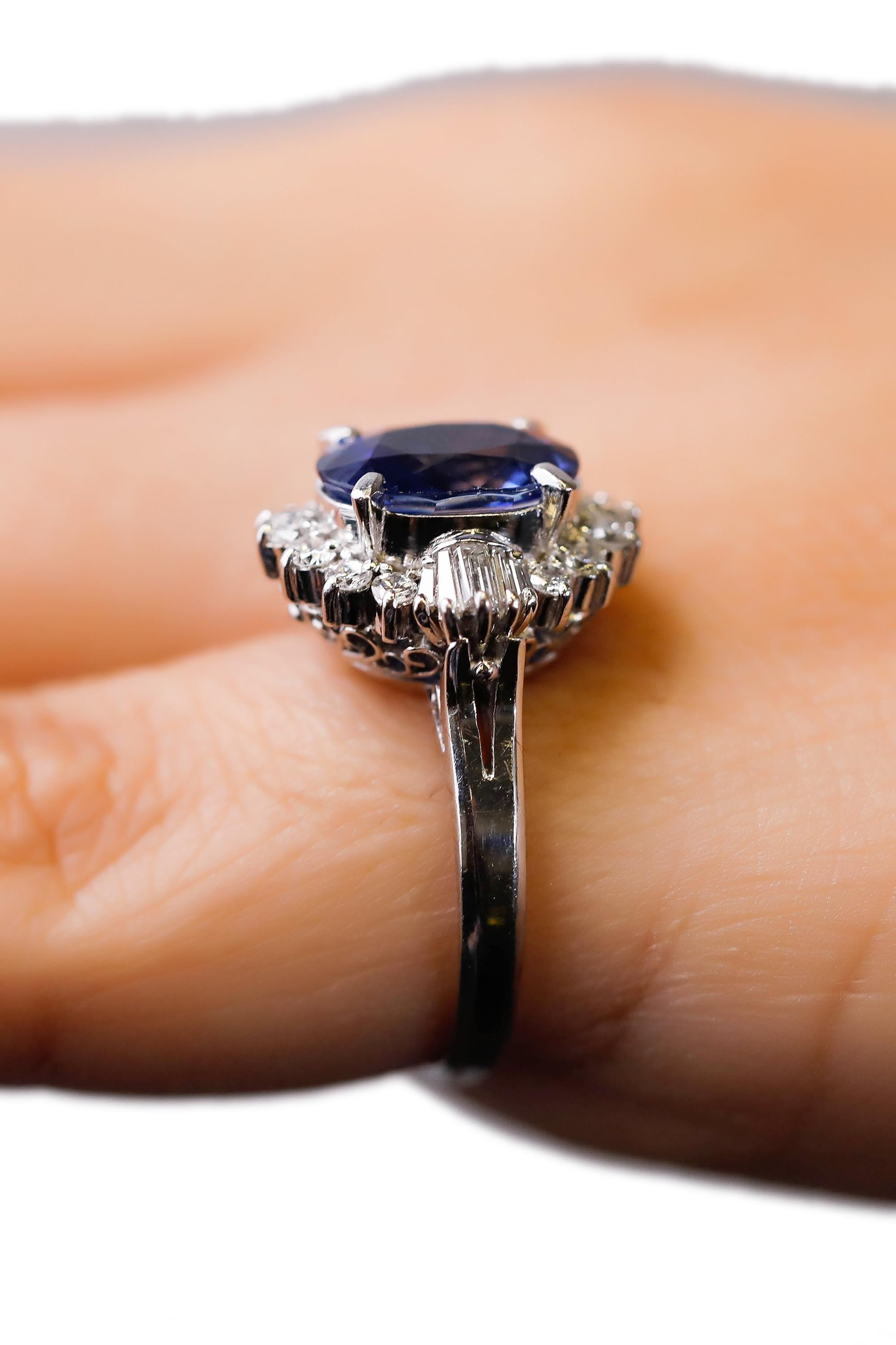 Victorian 3.11 Carat Oval Blue Sapphire 0.61 Carat Diamond Platinum Halo Ring Engagement For Sale