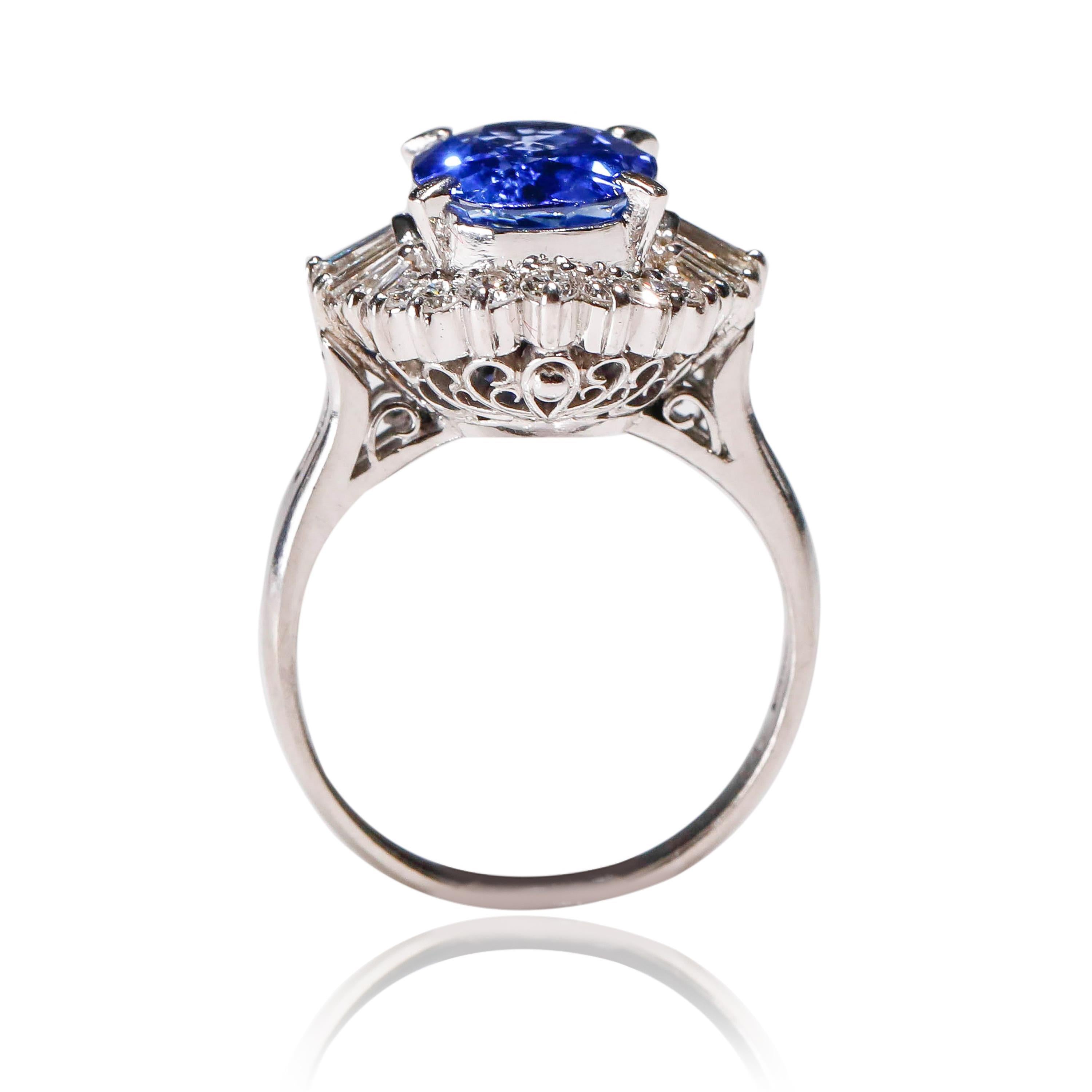 3.11 Carat Oval Blue Sapphire 0.61 Carat Diamond Platinum Halo Ring Engagement In New Condition For Sale In New York, NY