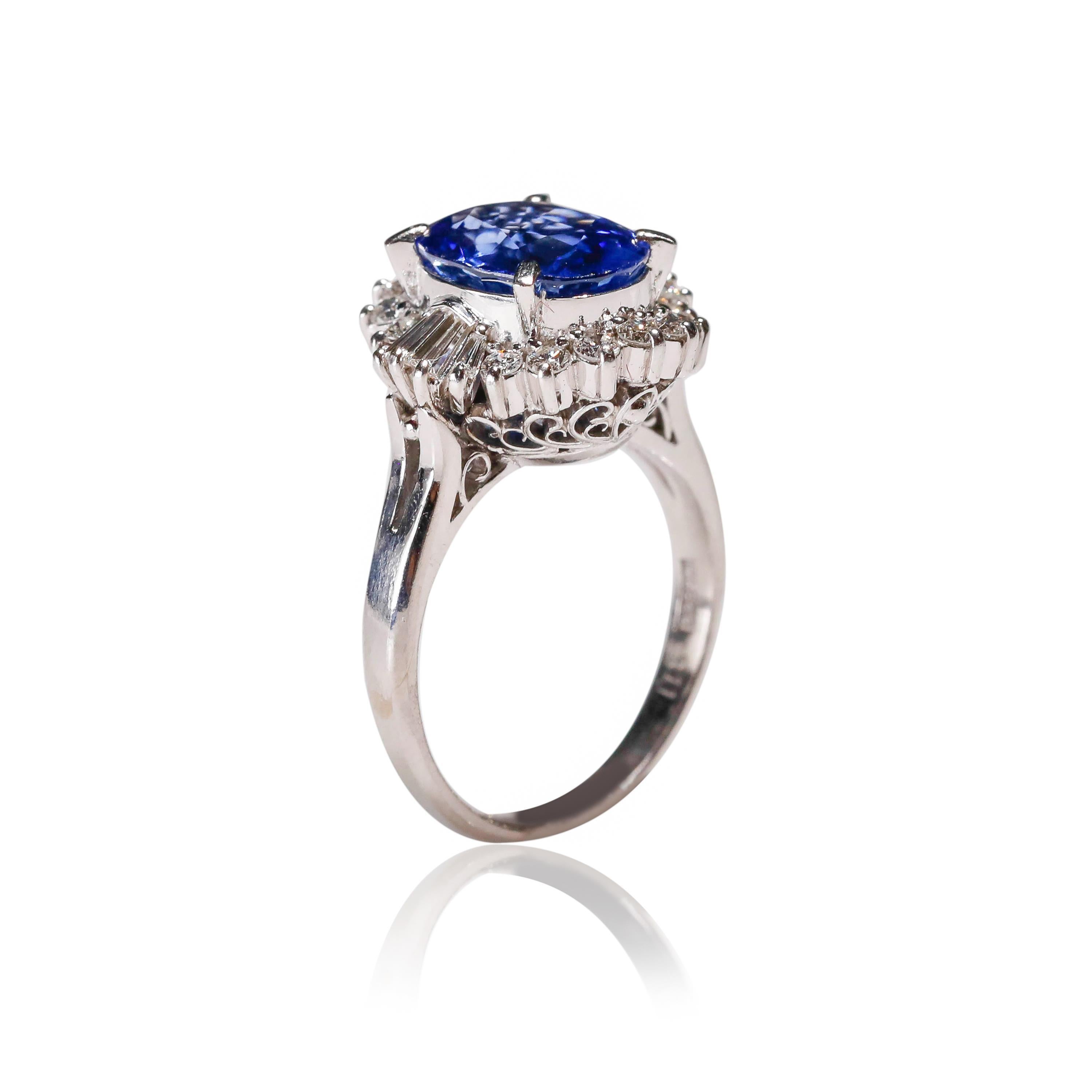 Women's 3.11 Carat Oval Blue Sapphire 0.61 Carat Diamond Platinum Halo Ring Engagement For Sale